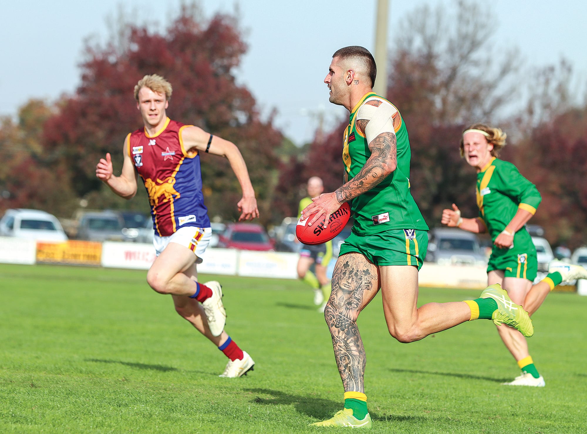 Tallin Brill looks down field as he goes on a run for Leongatha. A34_1825