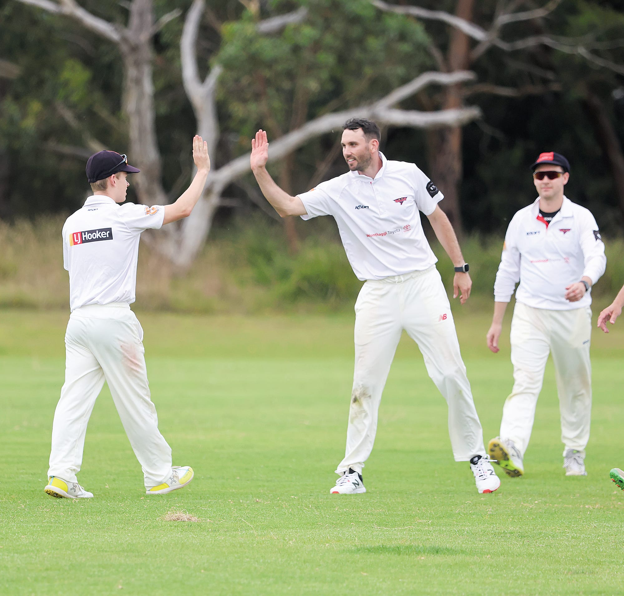 Dylan Clark thanks Jack Donohue for taking the catch to dismiss OMK captain Jacob Lamers on a day dominated by the ball and the tough batting conditions after rain during the week.