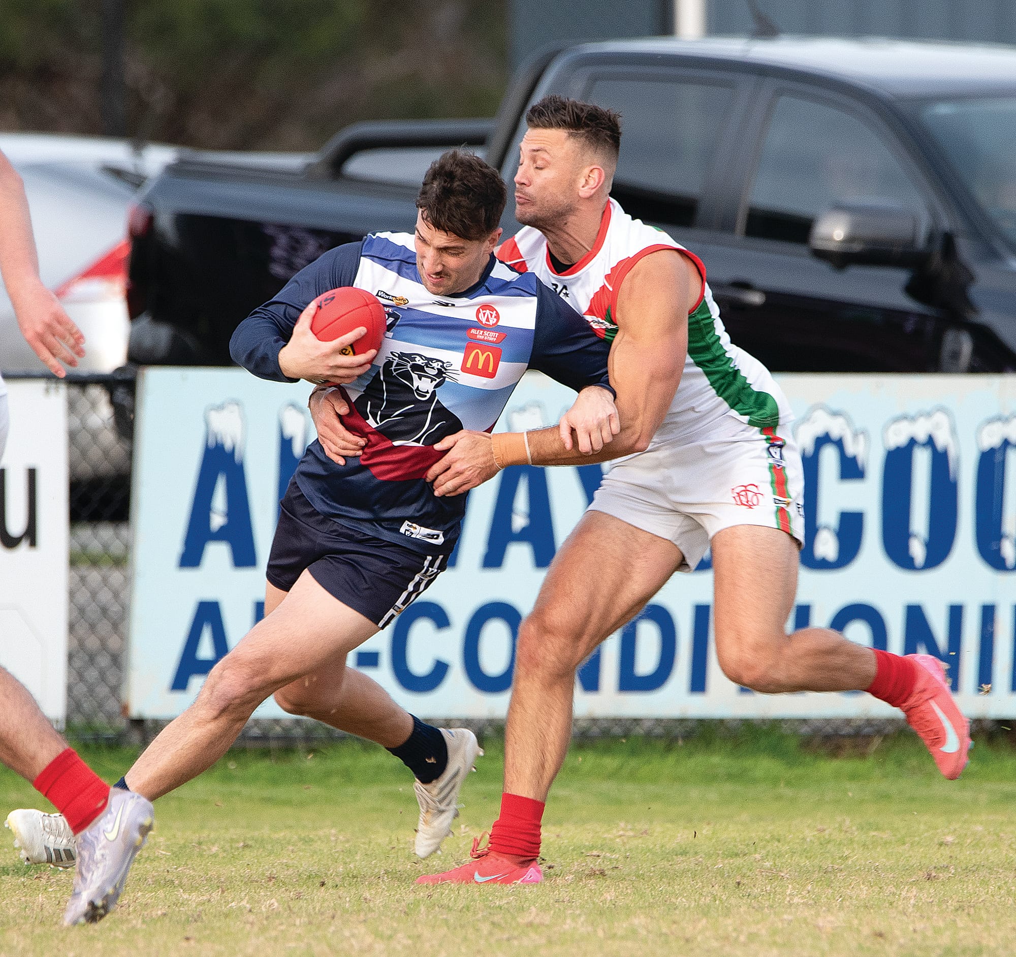Anthony Daraio attempts to fend off his Seagull opponent in the Panthers forward line.