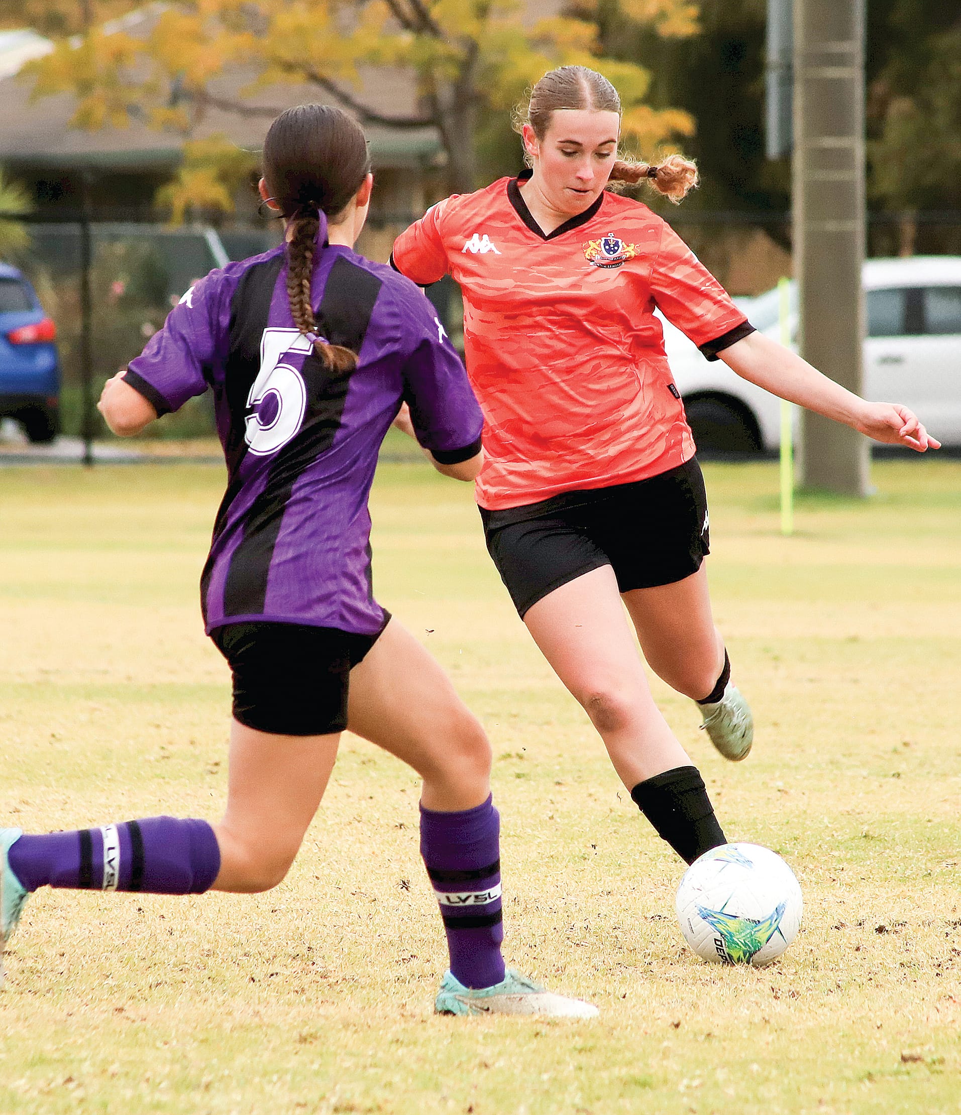 U16 Girls centre back Michaela Marr clears the ball from defence against her Latrobe opponent.&nbsp;