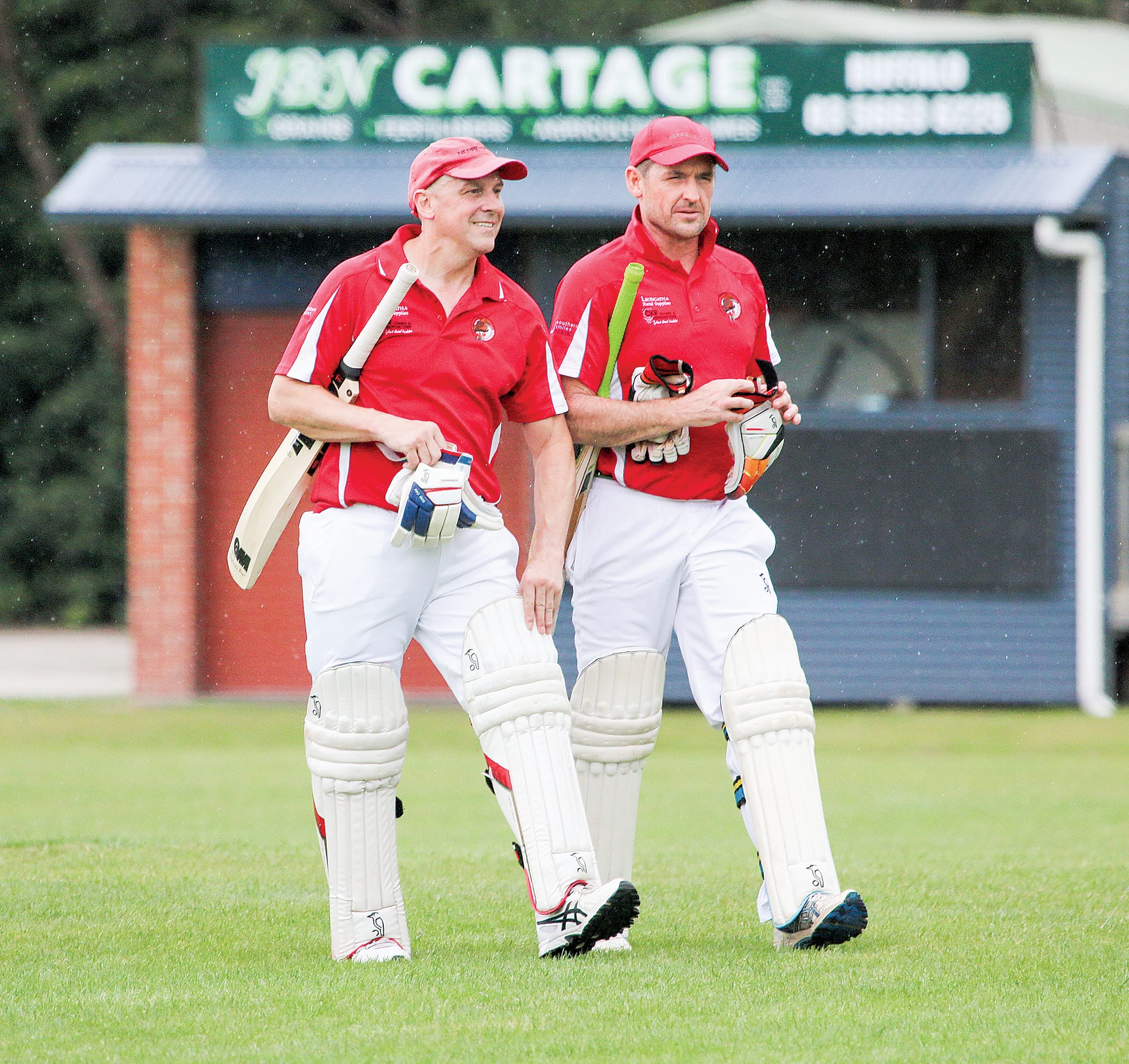 Dave Trotman 24 and Dave Baldi 99 not out take a break in the match between Nerrena and Meeniyan at Meeniyan.