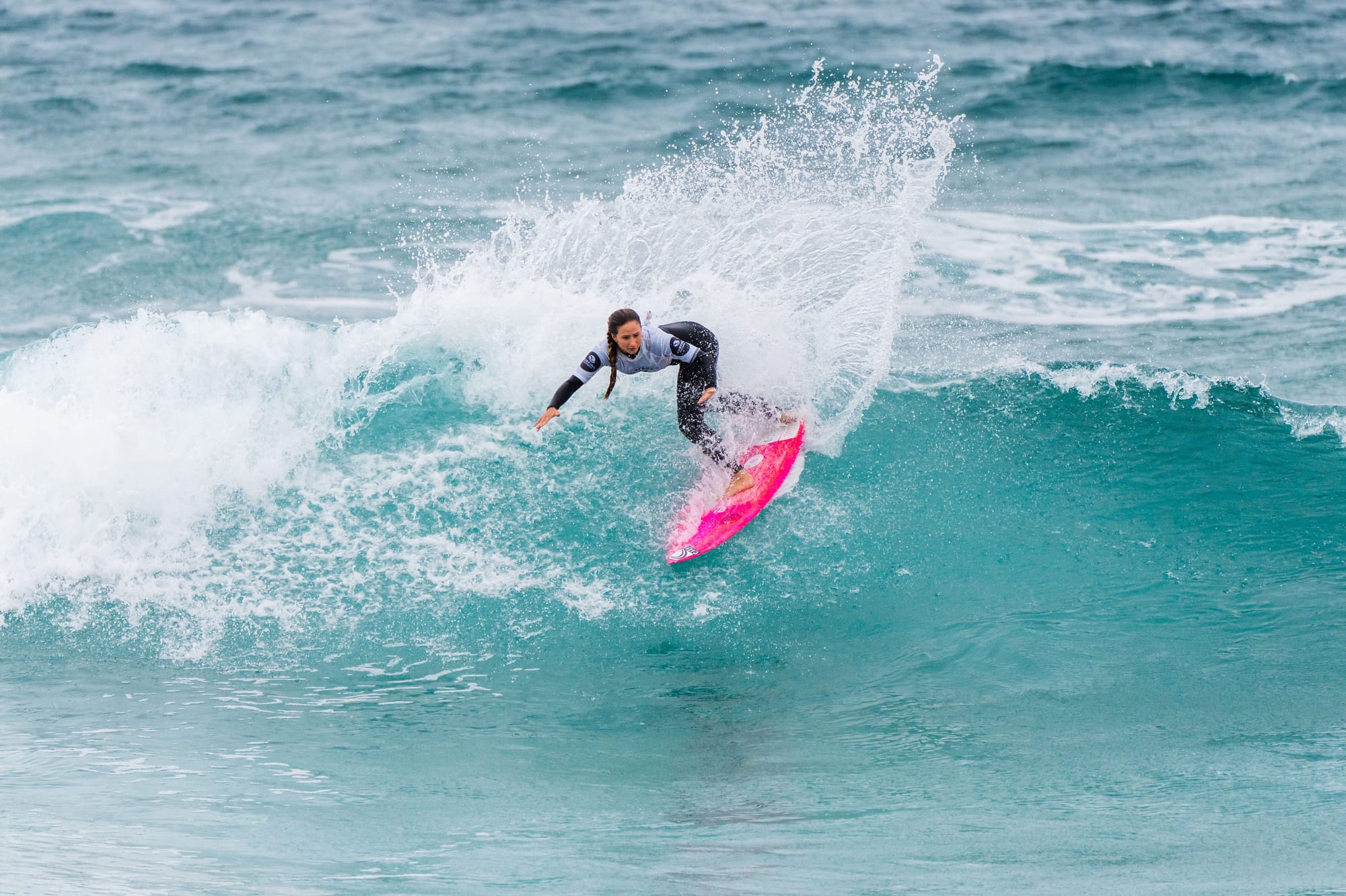 Junior surfing breaking waves this weekend