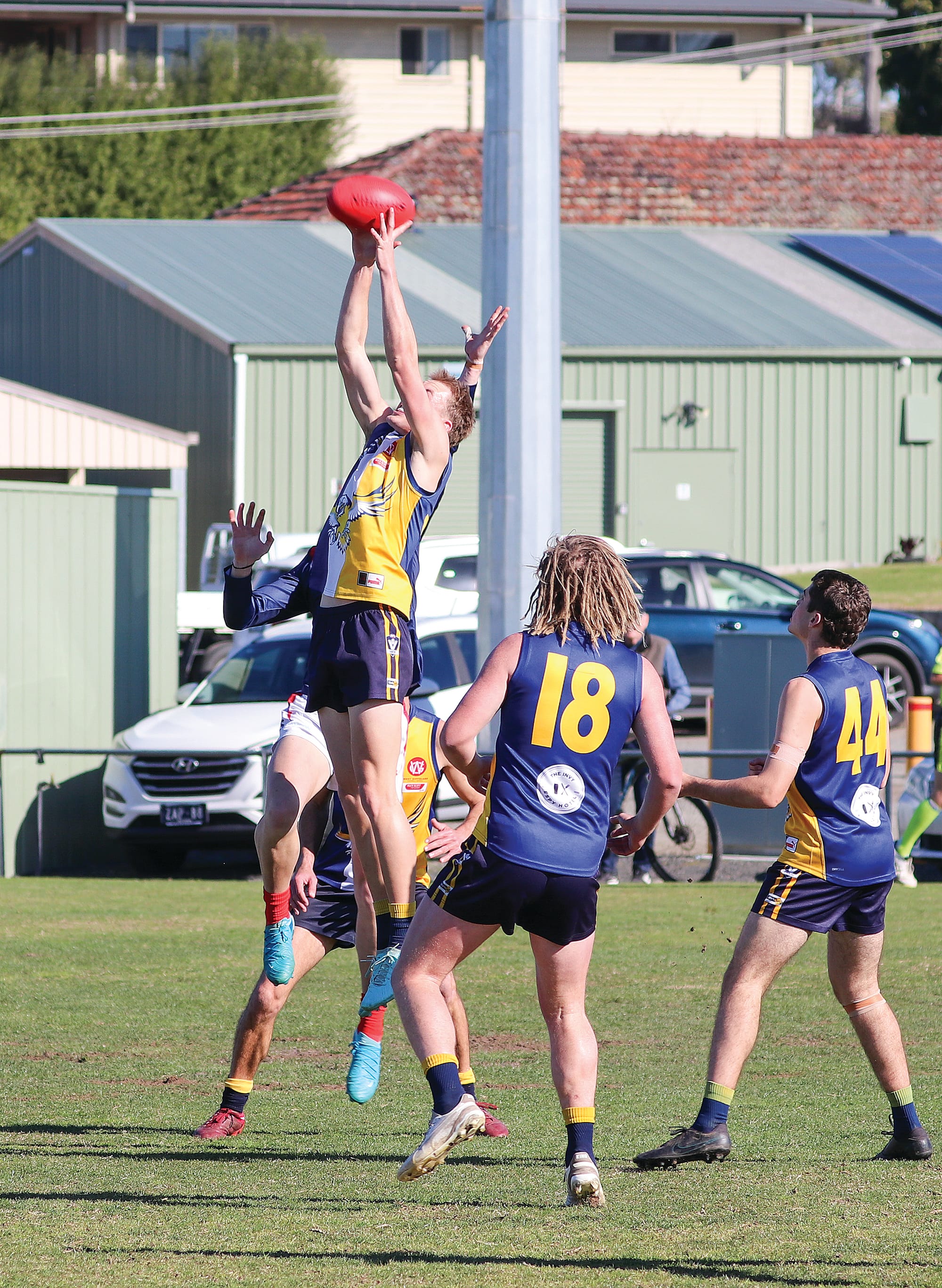 Lucas Allen showing off some bounce, leaping for an intercept mark in Inverloch’s backline.W11_3225