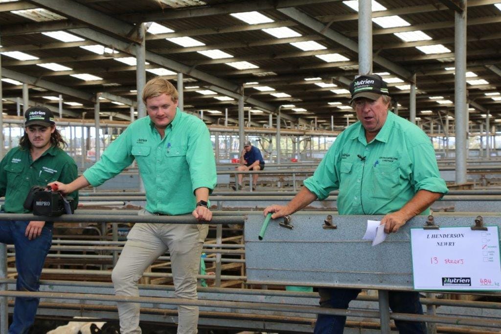 Nutrien auctioneer Brian McCormack with stockman/auctioneer Jack Ginnane at the Leongatha Saleyards on Friday. Ginnane compete at the ALPA National Young Auctioneers Competition at the Sydney Royal Easter Show the week after next.