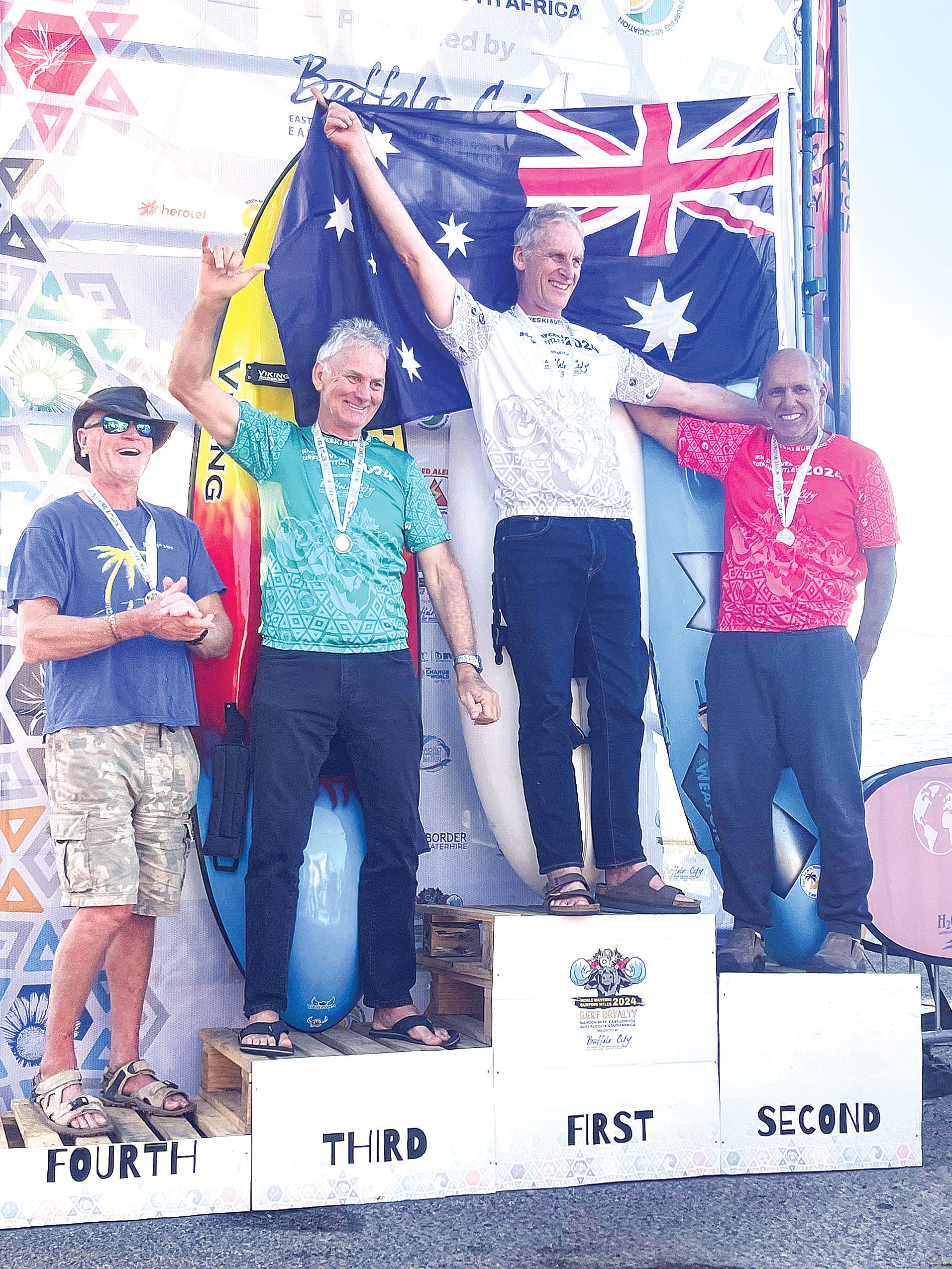 Bernard Huigsloot on the podium after winning the Legends Title at the 2024 World Waveski Surfing Championships.