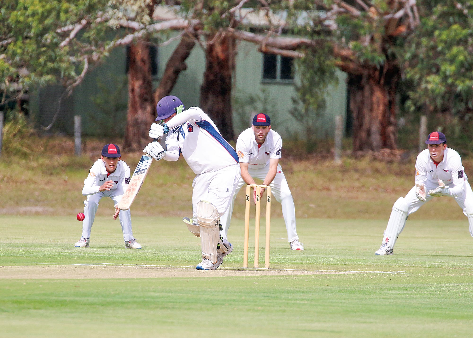 Mitch McGrath from MDU gets off a clean hit making 18 for the day, with Inverloch fielders at the ready. ob31_1225