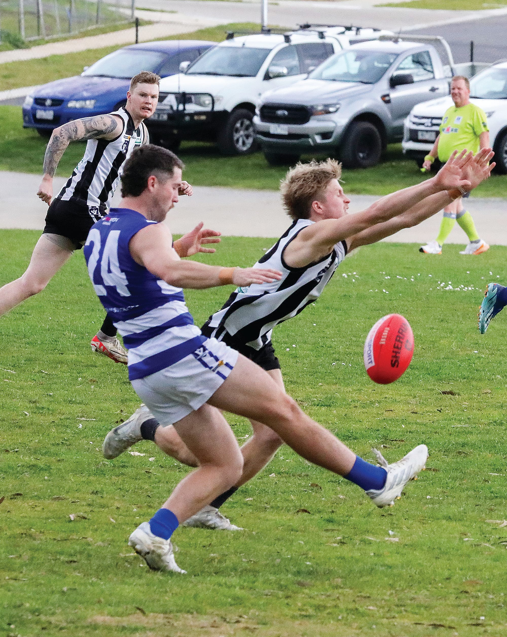 Alex Henshall applies pressure for Poowong against Neerim South but the Cats prevailed in the Senior game. Photo: Jeff Tull.