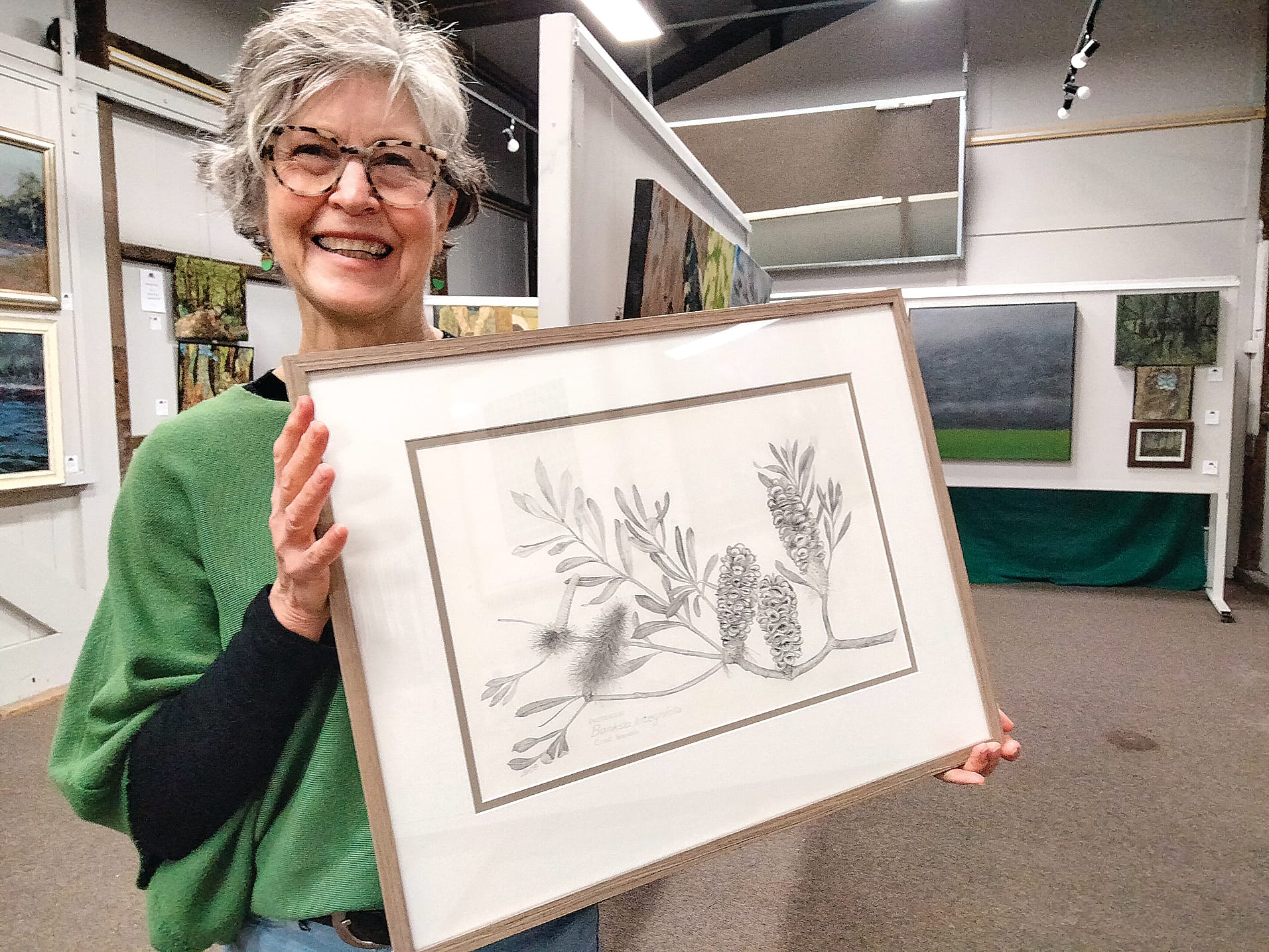 Cathie Beanie is the happy new owner of Liz McDonald’s “Banksia integrifolia”.