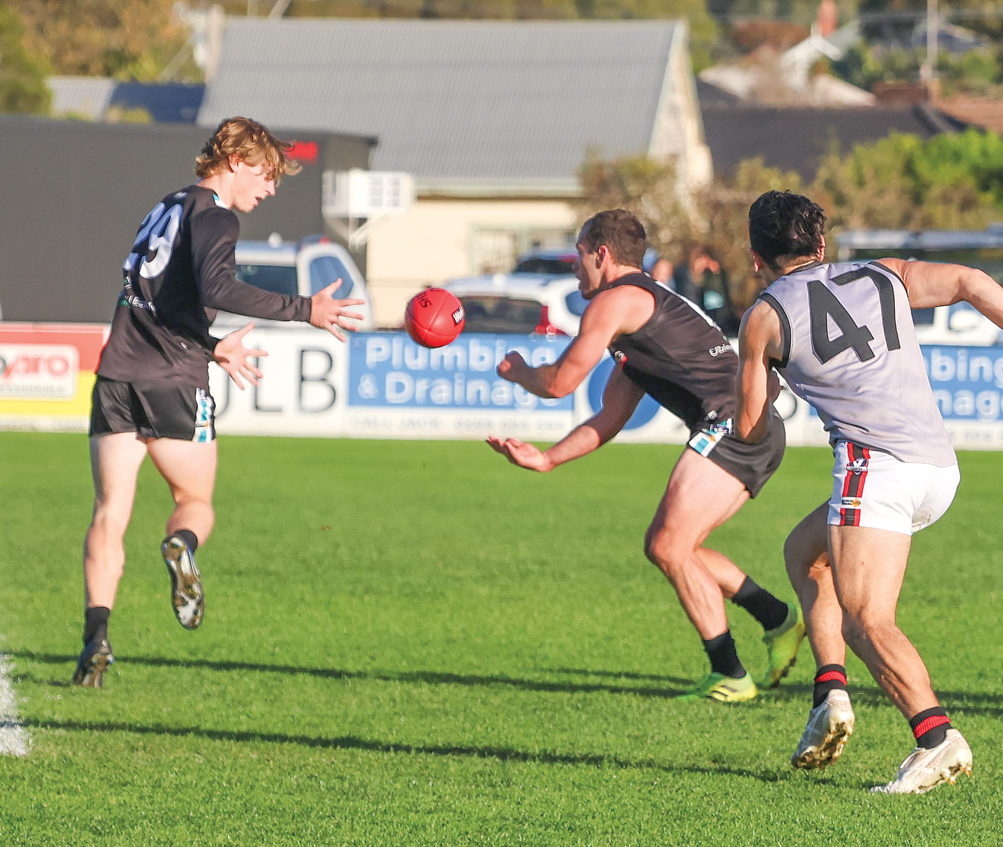 In a typical passage of play for the day, Jarryd Blair feeds it out to Isaac Chugg as Wonthaggi Power dominated the stoppages in an all-important third quarter.