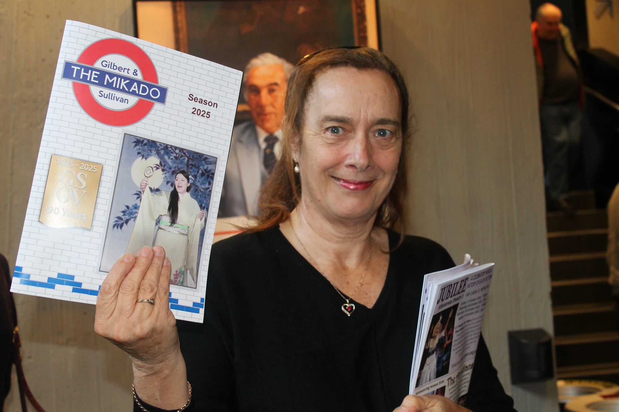 Agnes Liberatore selling programs for The Mikado coming to Berninneit on August 9 (SOLD OUT) & August 10 (SELLING QUICKLY). B70_2925