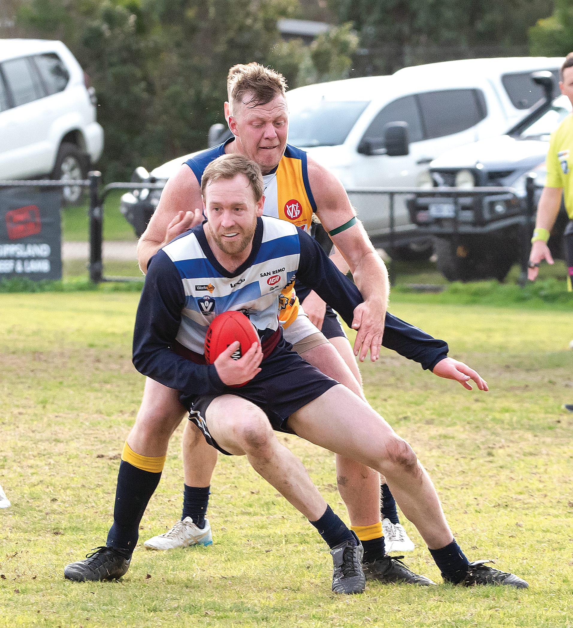 Dale Gawley attempts to clear the ball for the panthers.