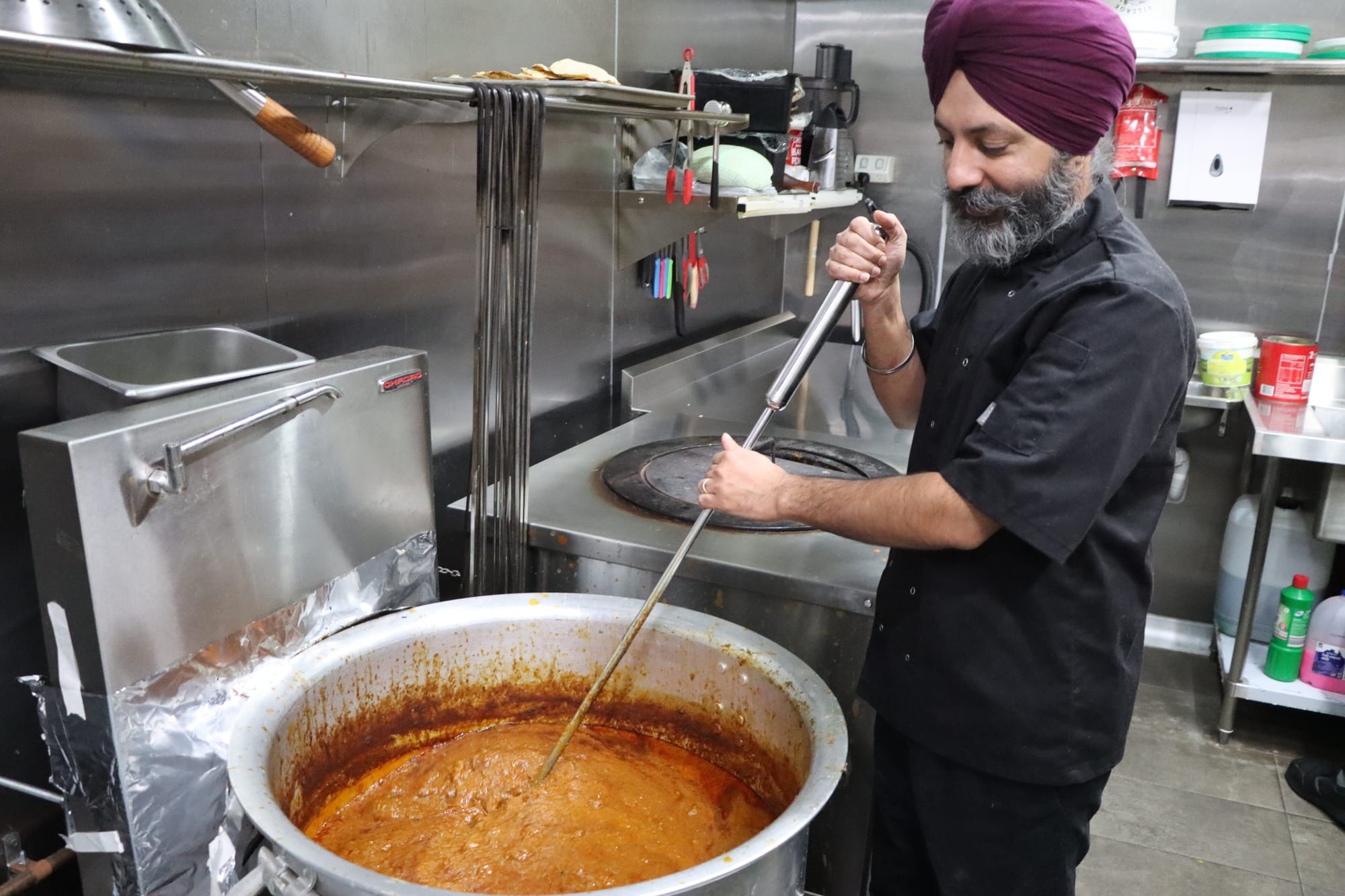 Savneet Dhillon gets a delicious lamb curry ready for a busy weekend. A08_2523