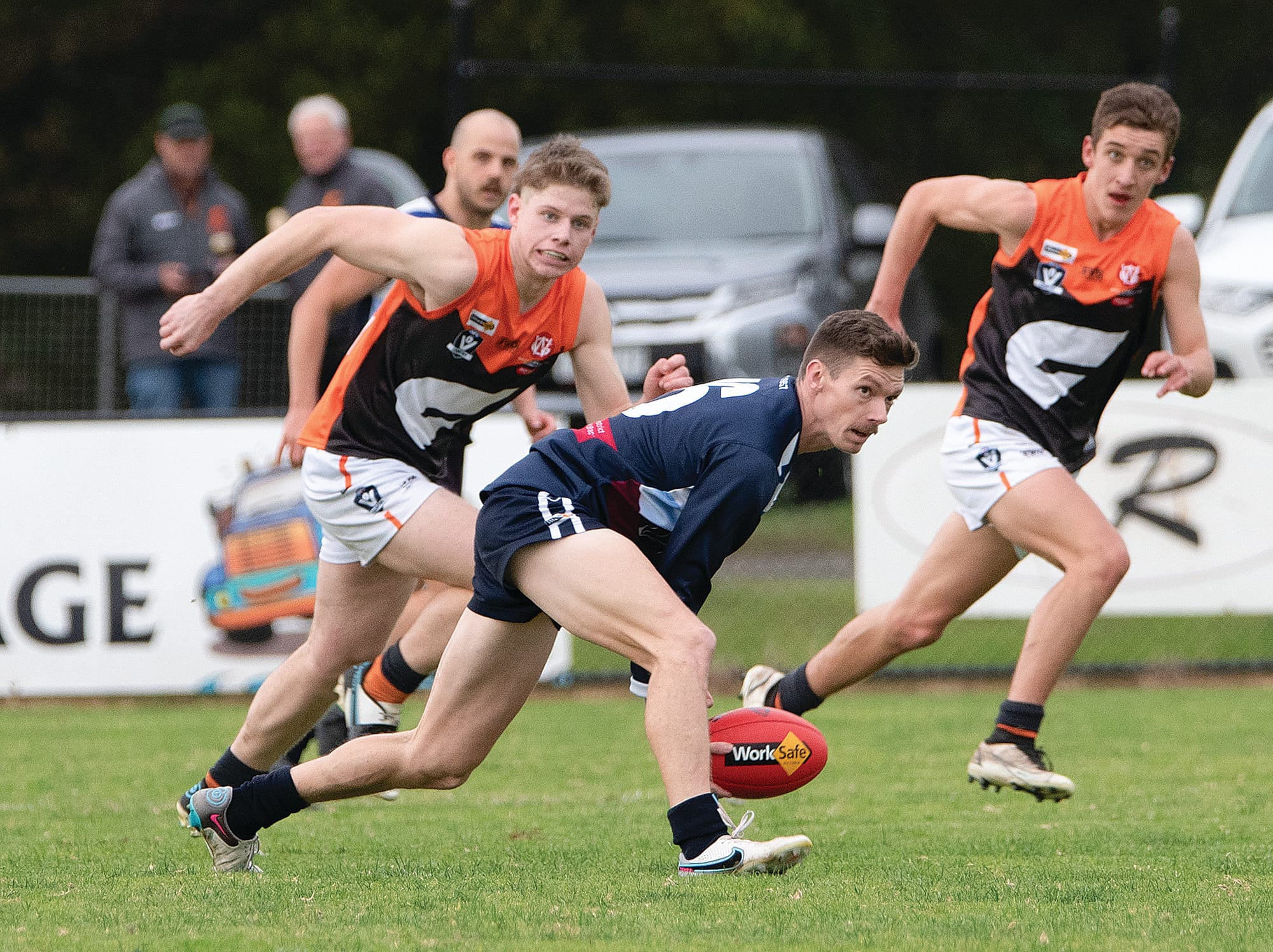 Mitchell Wood looks to handball to his team mates.
