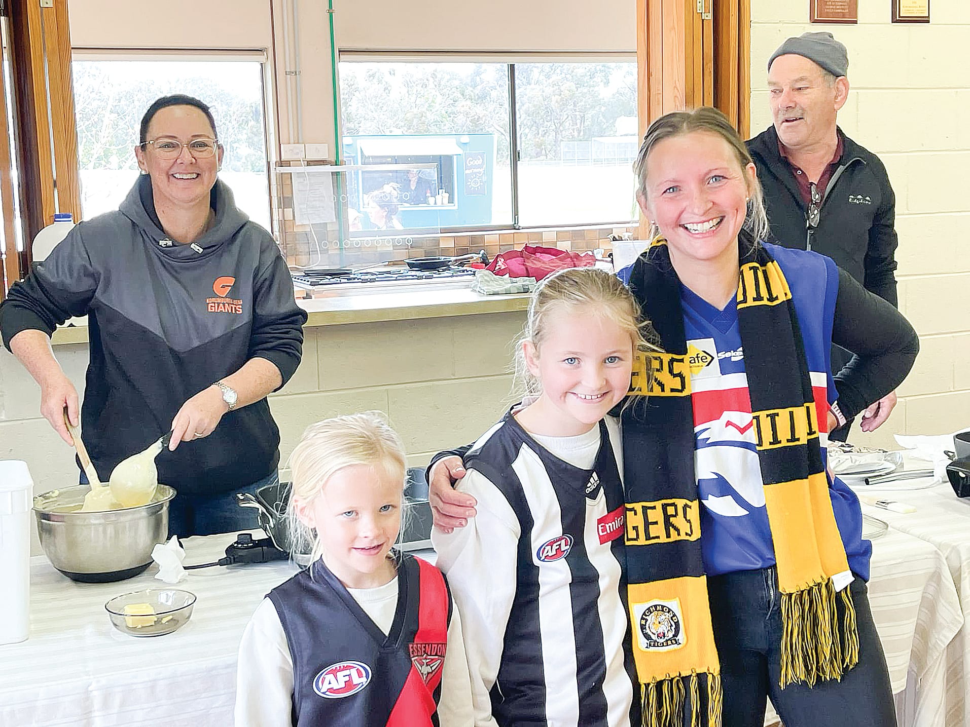 Committee members Kellie Walker and Stuart Olsen were kept busy serving pancakes to Harper and Charli White and organiser Ebony Knox. 