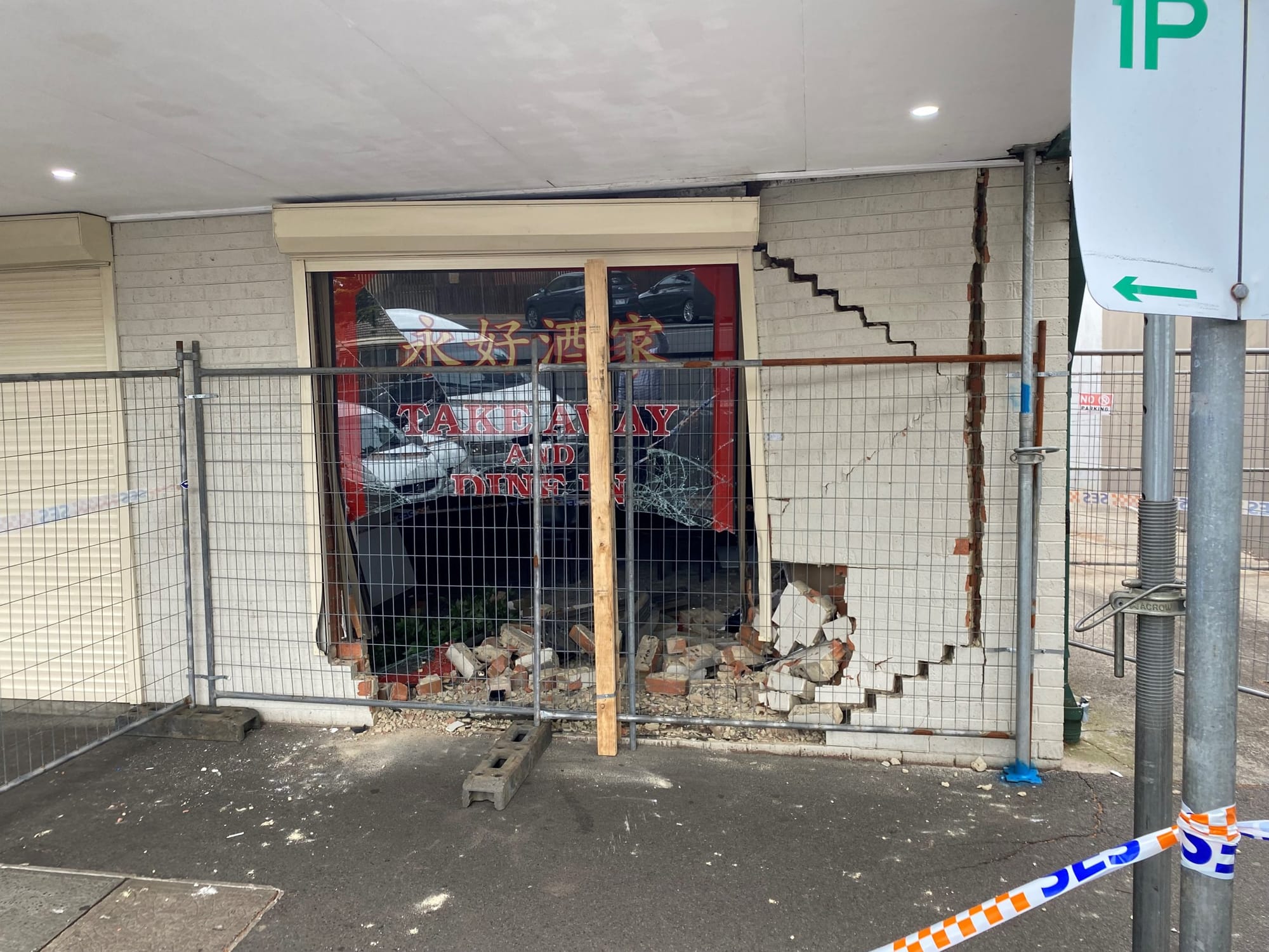 Close call after car smashes into restaurant