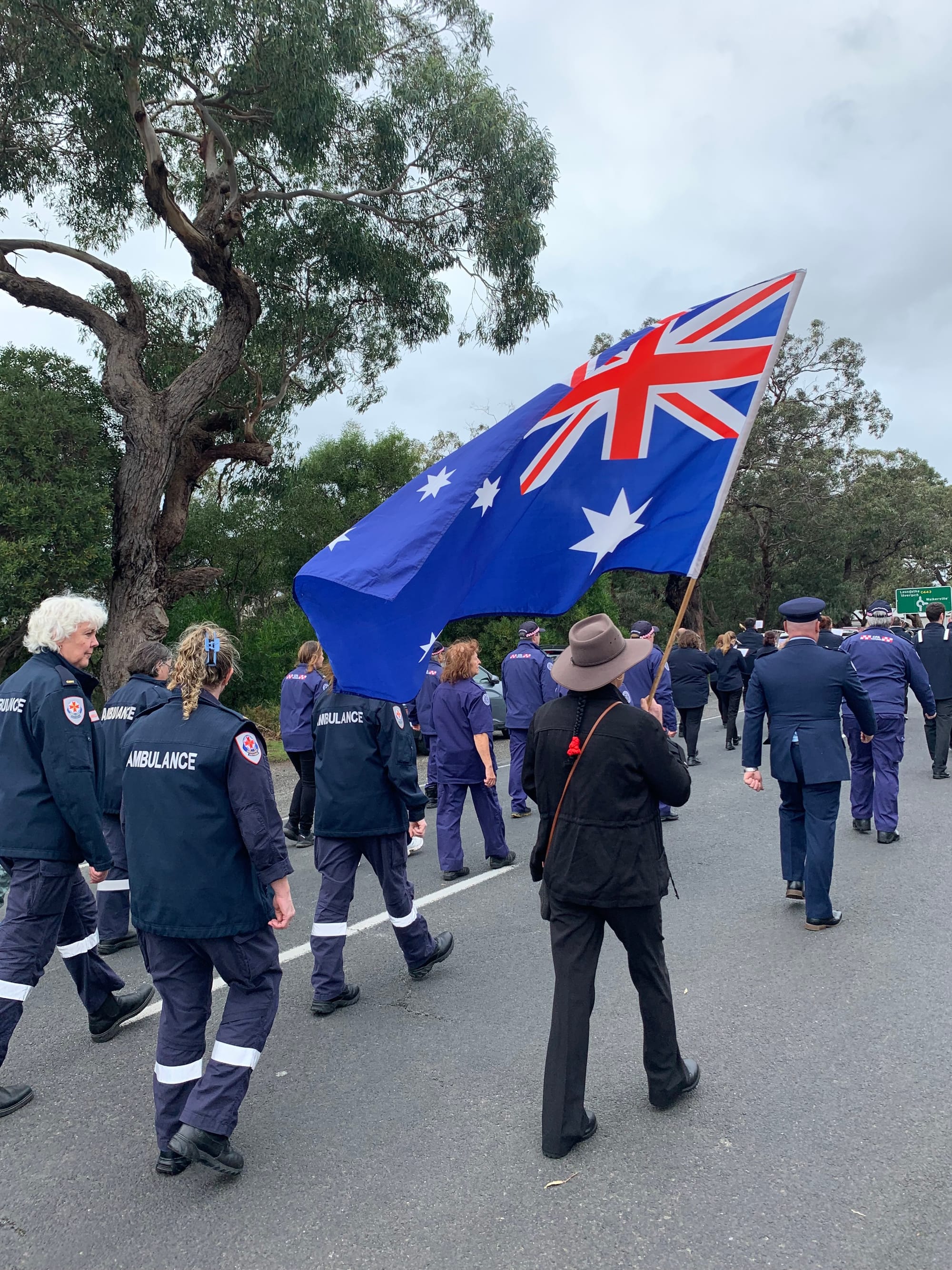 Local emergency service representatives take part in the march.