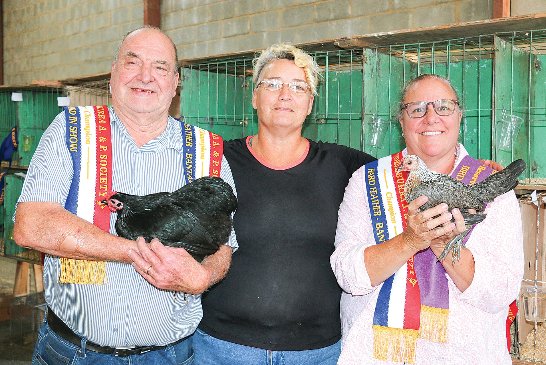 Churchill’s Kevin Collins won Champion Bird in Show with an Australorp female and Lang Lang’s Lyn Mackay won Reserve Champion Bird in Show with an OEG Duckwing female. They are pictured with judge Kath Macklin from Stratford (centre). 