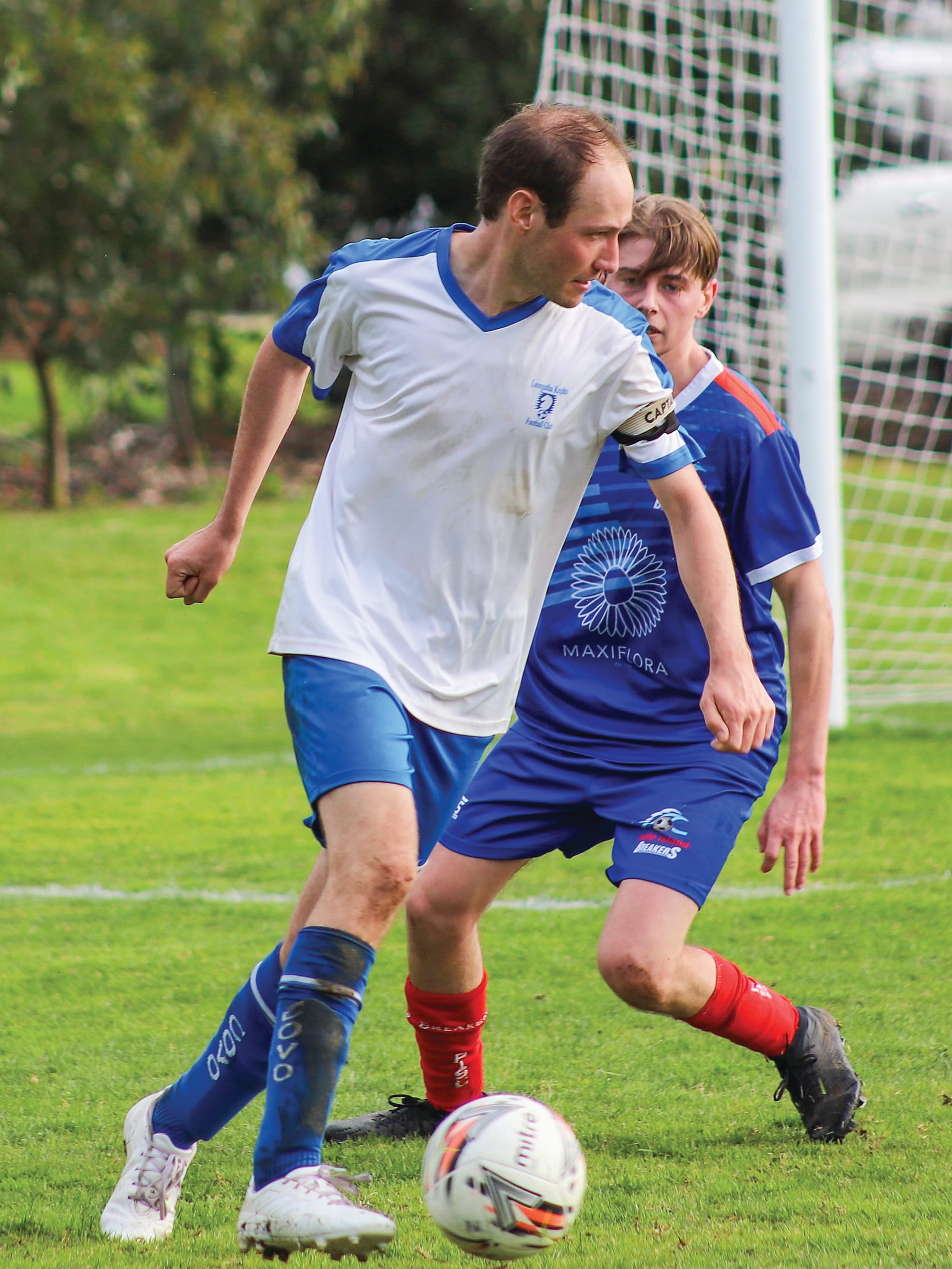 LKFC Captain Sven Gebele works the ball out of defence.