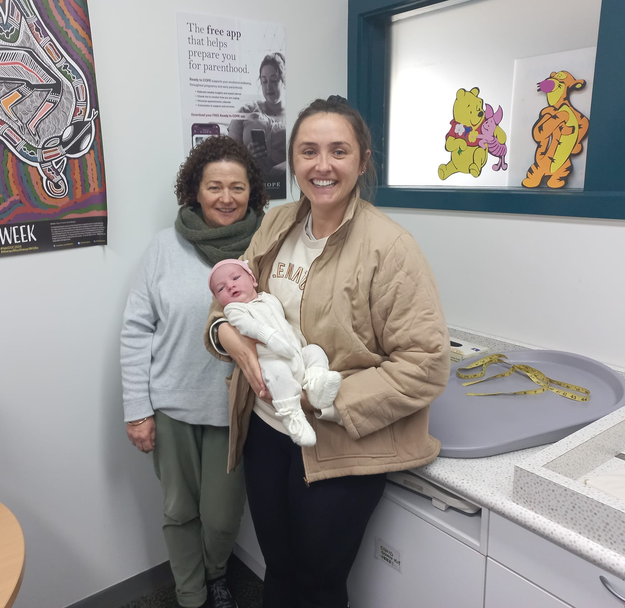 Bass Coast Health Maternal and Child Health Nurse Allyson Bentley consults mother Jade Taylor and baby Abby Toohey.
