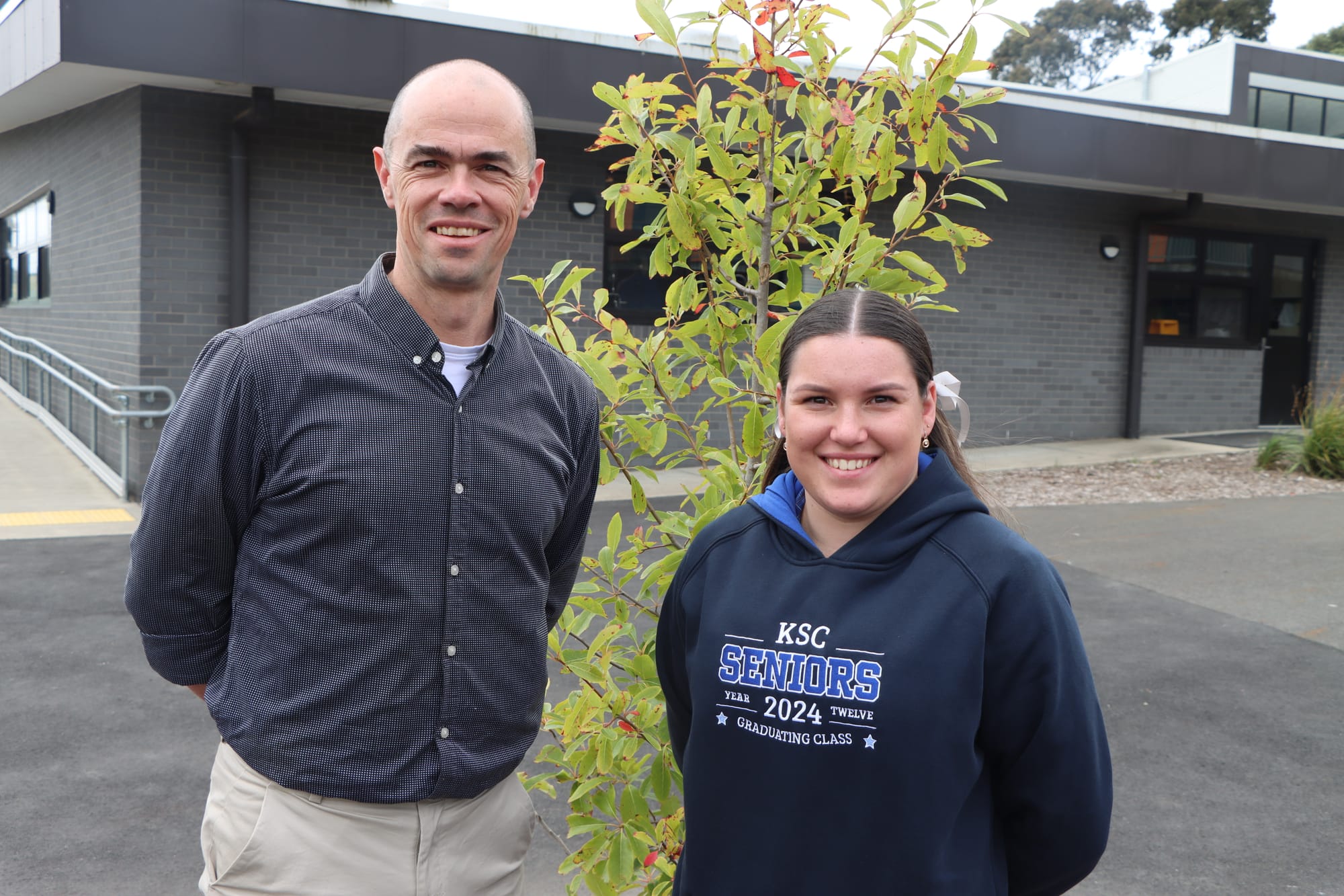 Korumburra Secondary College principal John Wilson with VCE Vocational Major student Breanna de Bondt.