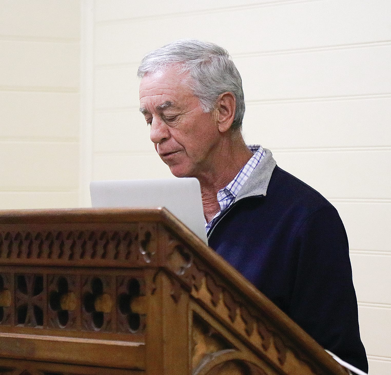 Peter Lawrence and his fellow residents gathered at the Rhyll Hall on Tuesday, urging council to abandon the current path plans and bring forward construction of the headland trail. Z06_1123