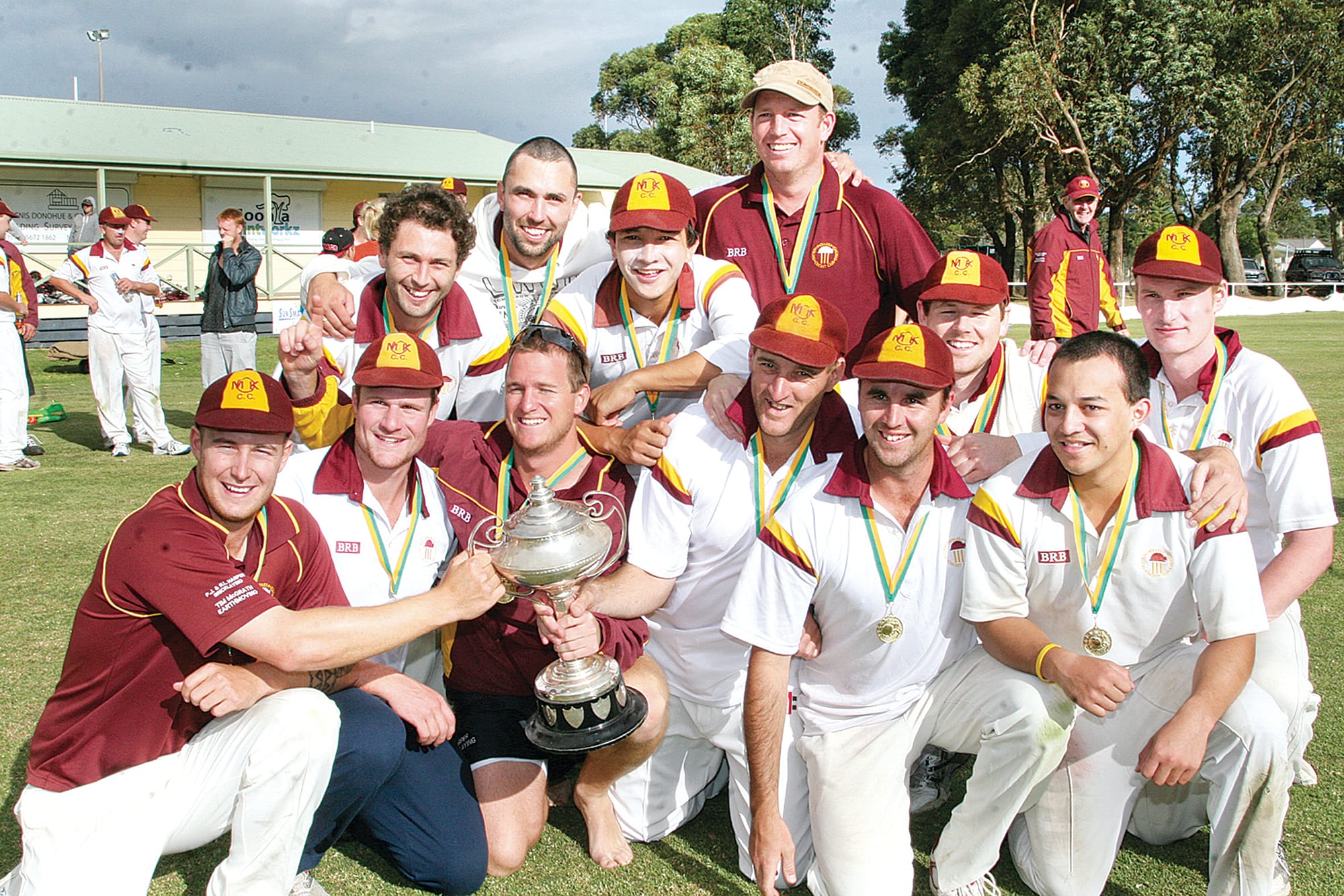 Peter (fourth from left, front) was part of the winning OMK team in the Leongatha and District Cricket Association A Grade 2012/13.
