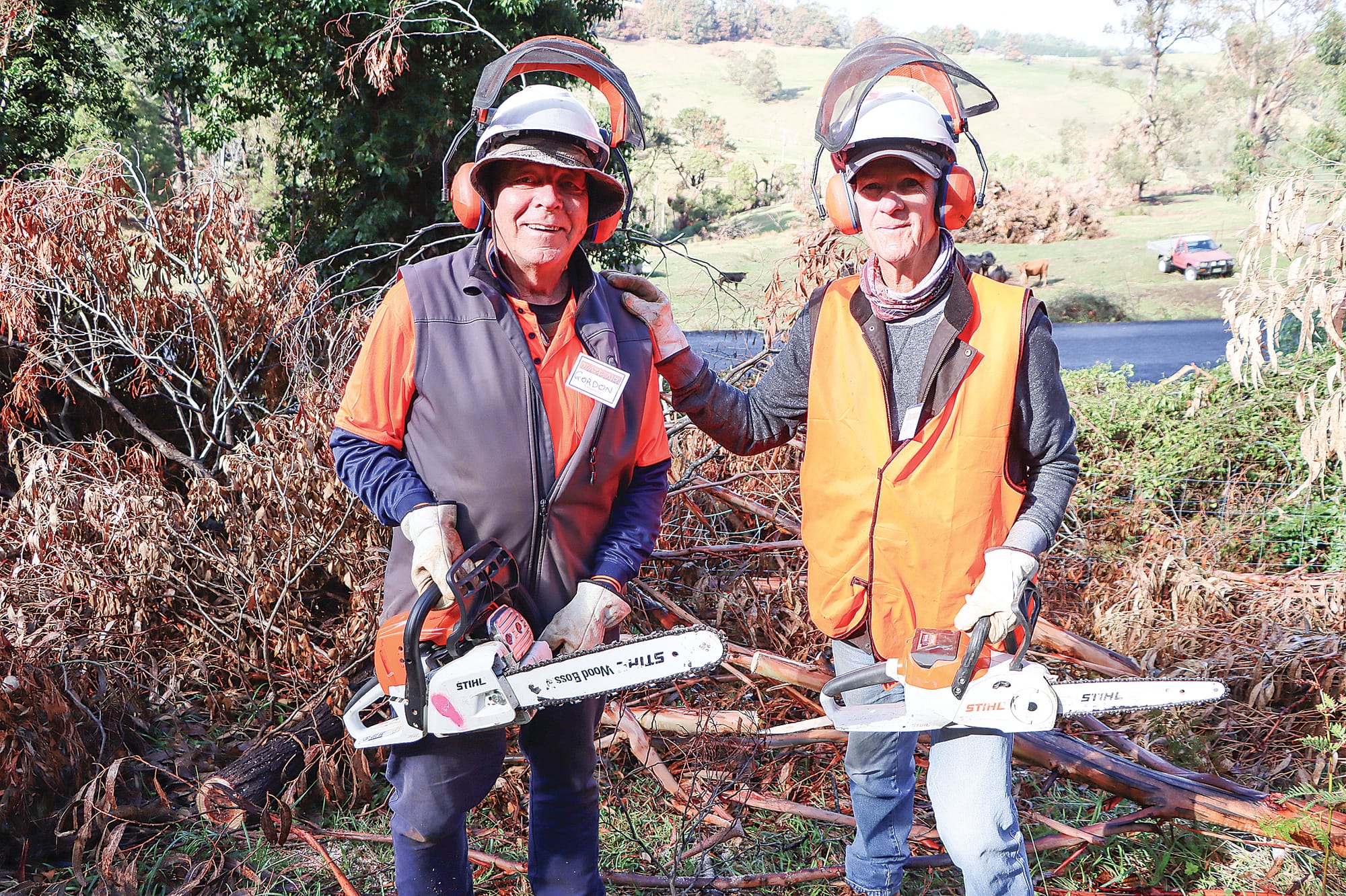 Gordon Arnel and Iain Batten look forward to cutting fallen vegetation down to size. A02_1624
