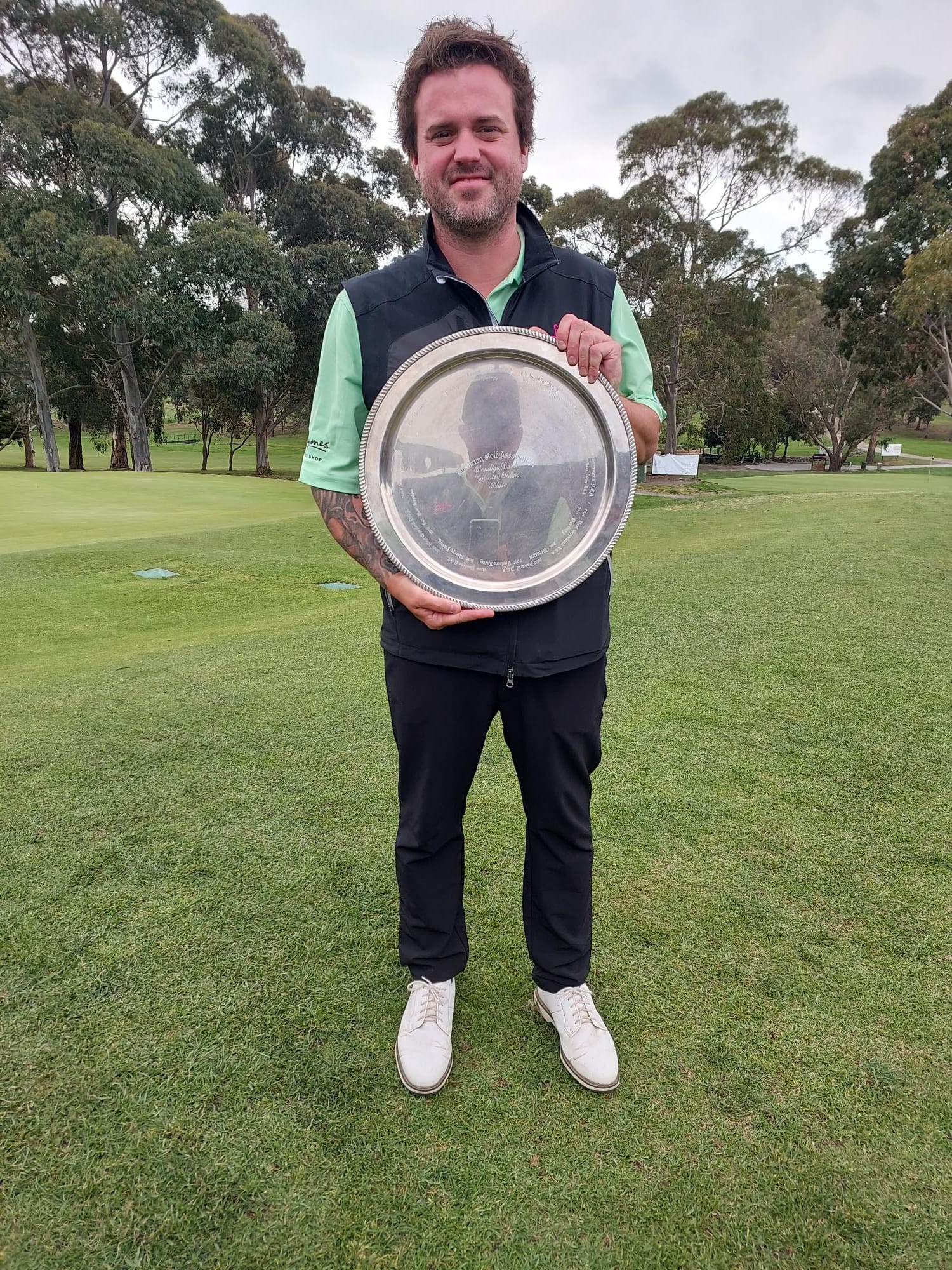 Captain of Korumburra Steve Bromby with the Bendigo Bank Country Teams Plate.