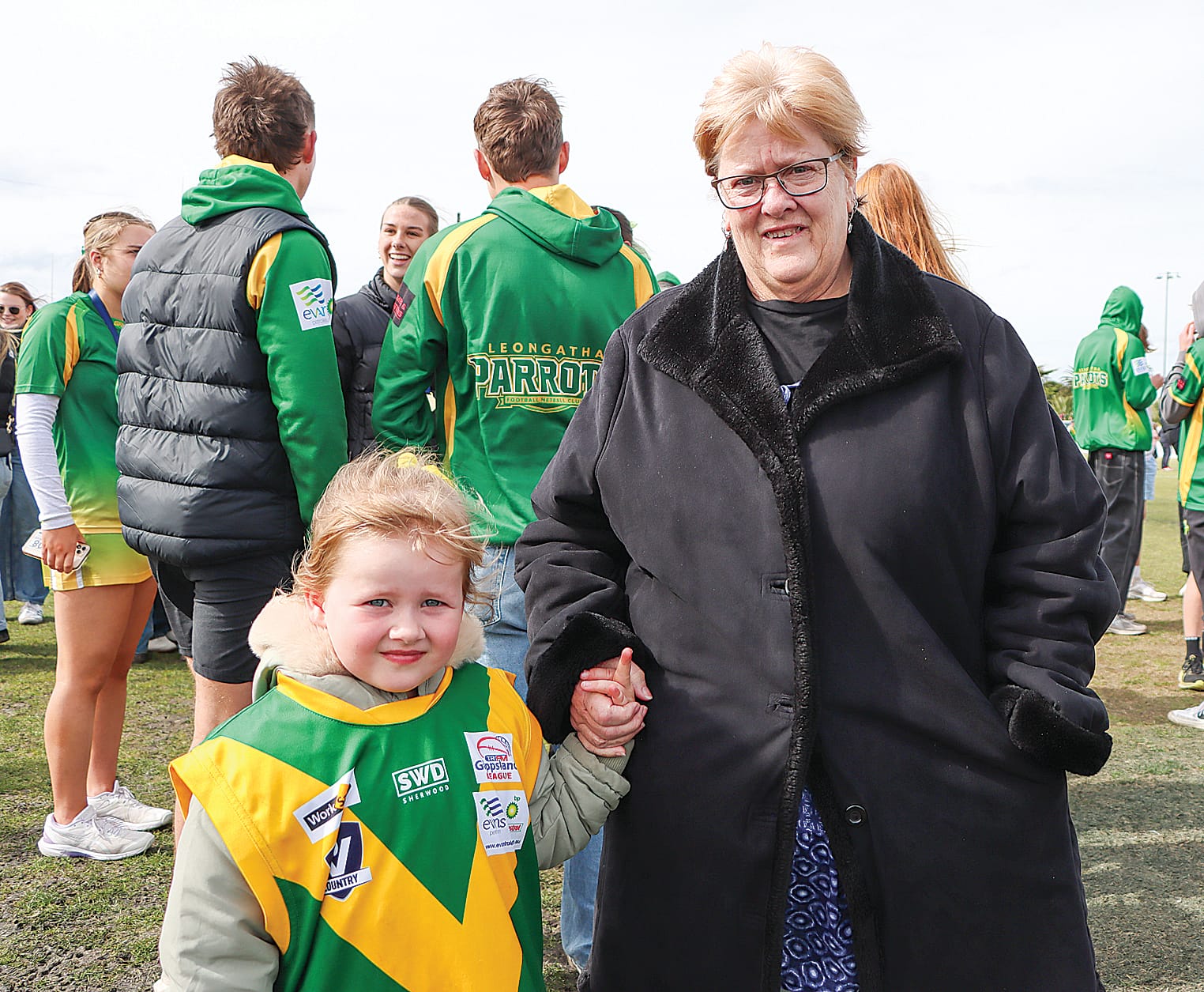 Georgia Hulls and Judi Spokes join the Leongatha premiership celebrations after the Reserves Grand Final, with Judi’s nephew Flynn Materia having played in the match. A57_3924