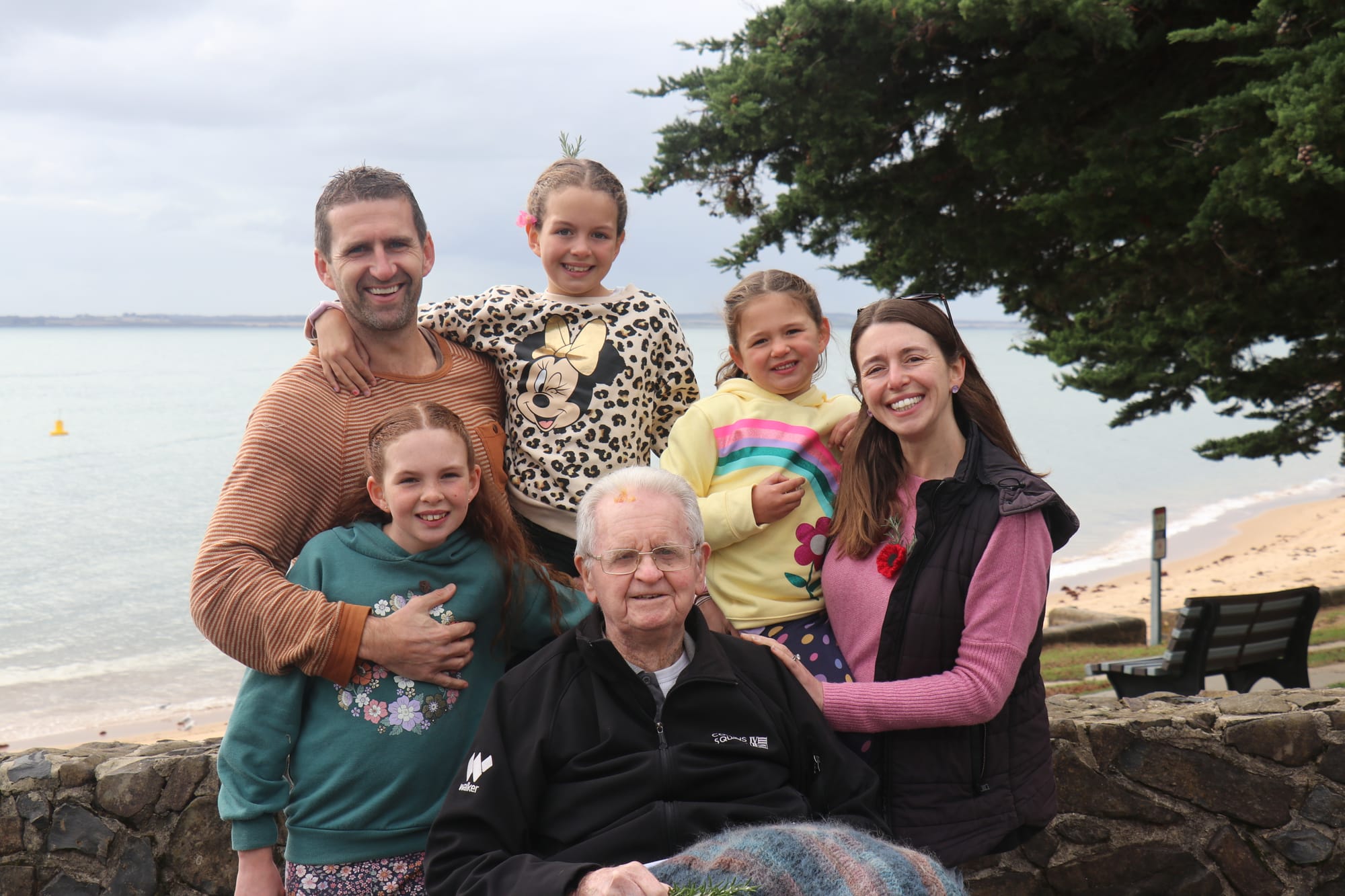 The White family: Chris, Tilly, Lulu, Chloe, Rosie, and Ken attend the Cowes cenotaph for the Anzac Day morning service. 