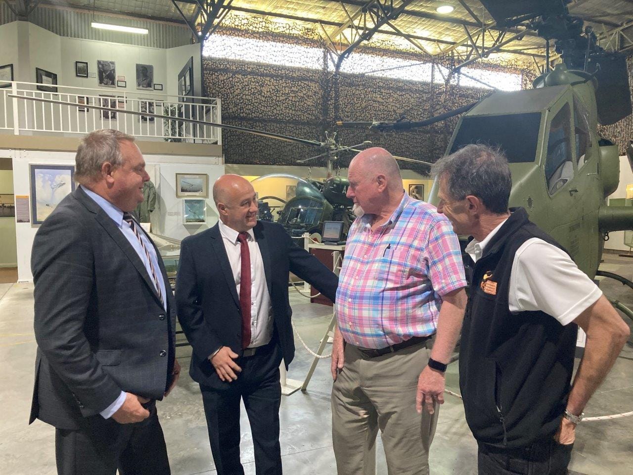 Shadow Minister for Veterans, Tim Bull, chats with Nationals candidate Brett Tessari, NVVM Board Member Phil Dressing and General Manager NVVM Braxton Laine while viewing the exhibits on Monday this week.