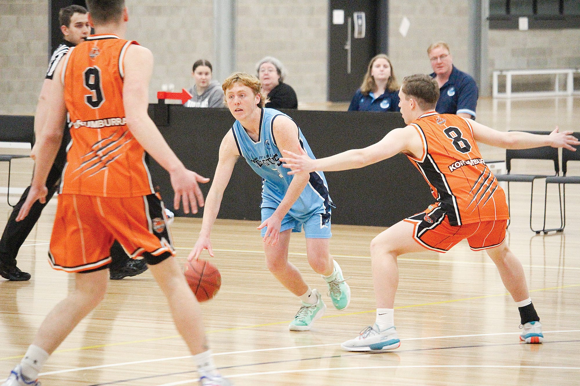 Coasters guard Zak Box is closely defended by Korumburra’s Nick McKenzie.