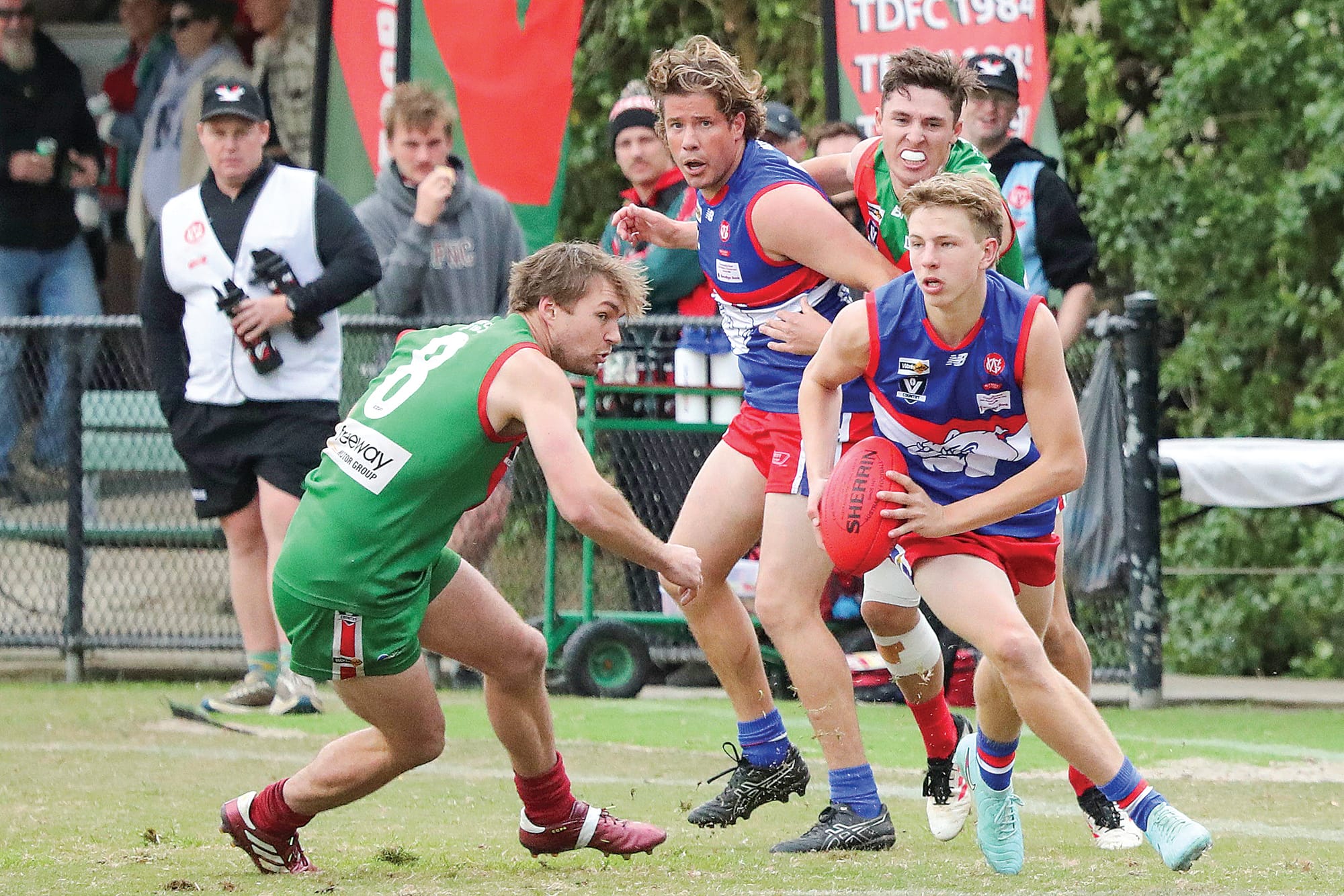 Young Bulldog Bailey Hennessy dashes clear for Phillip Island, with the aid of a shepherd from teammate Daniel Pearce, during Saturday’s thrilling Senior contest against Tooradin-Dalmore in which the Bulldogs charged back into contention in the second half but fell a couple of points short. Photo: Carol Ratcliff.