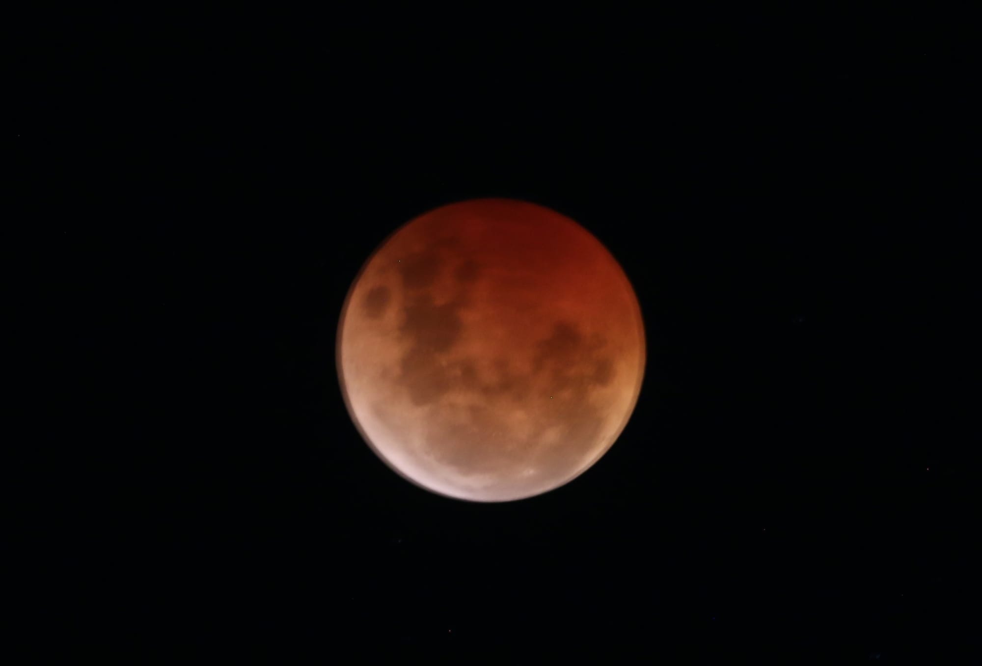Bloody great show as moon eclipsed by earth's shadow