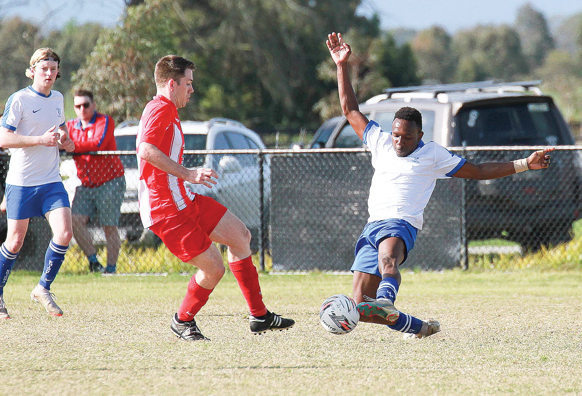 Leongatha’s Henry Mbuthia put his body on the line in the Senior Men’s grand final, under pressure from Trafalgar’s Jackson Landy.