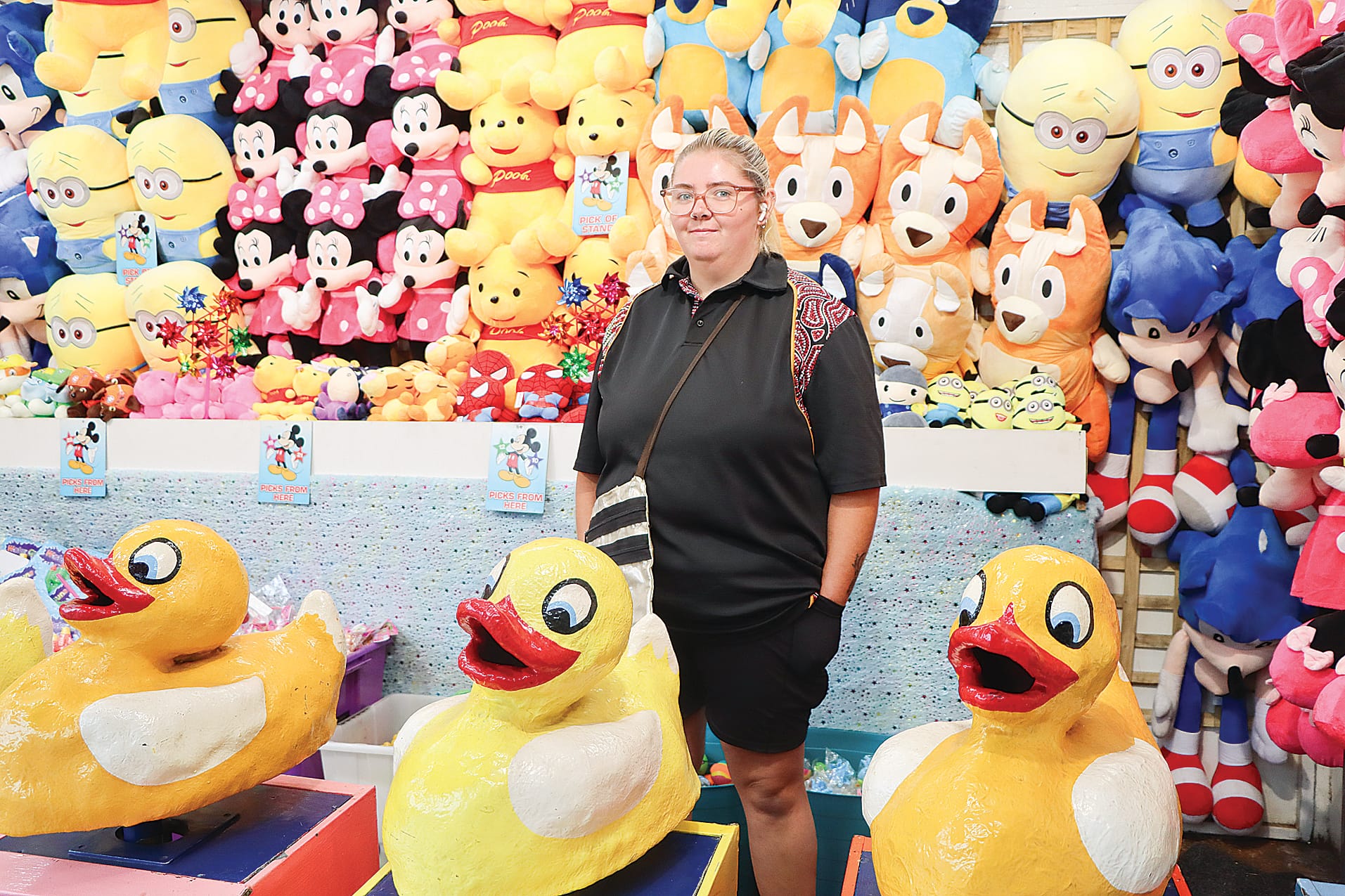 Chelsea enjoys meeting people and seeing new places as she takes charge of the Laughing Ducks sideshow game. A20_0924
