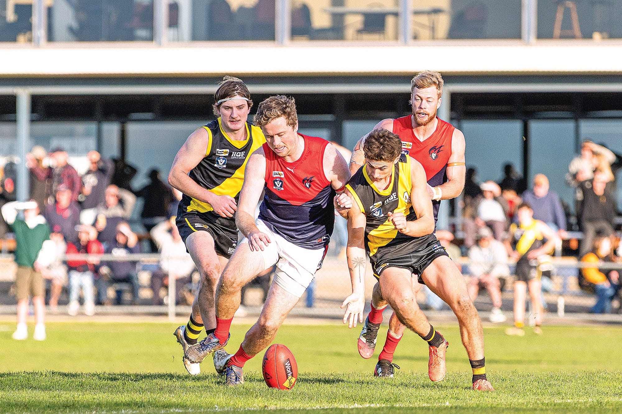 MDU’s Lachie Wright puts his body on the line to get to the ball ahead of his Mirboo North opponent on Saturday. 