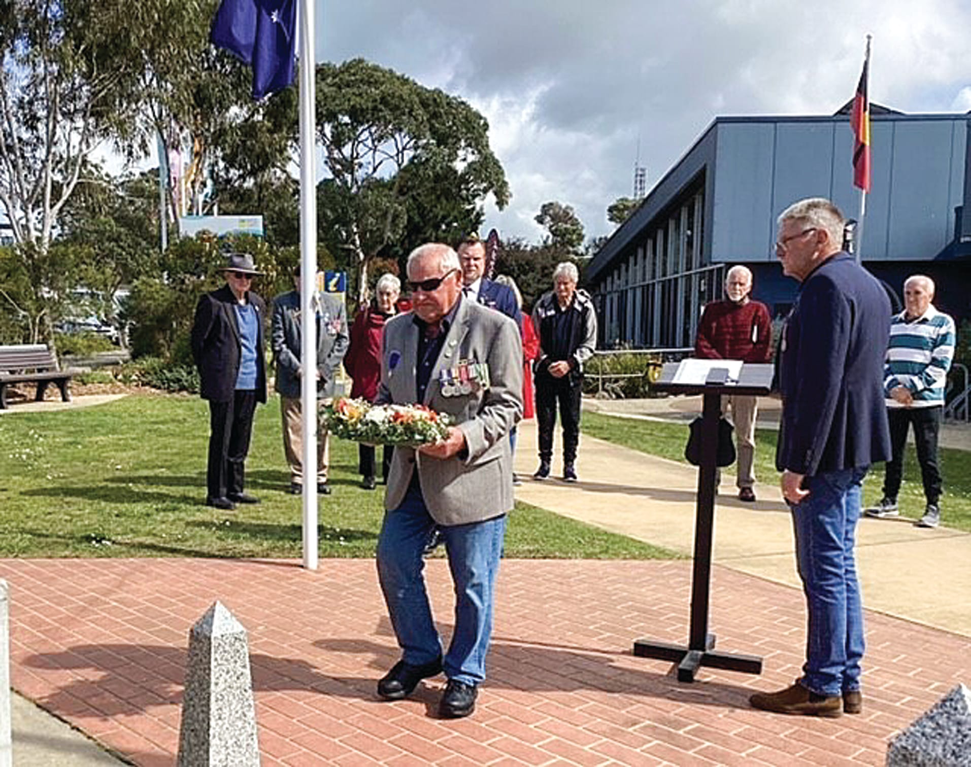 Inverloch RSL past president Bob Sutton lays a wreath.