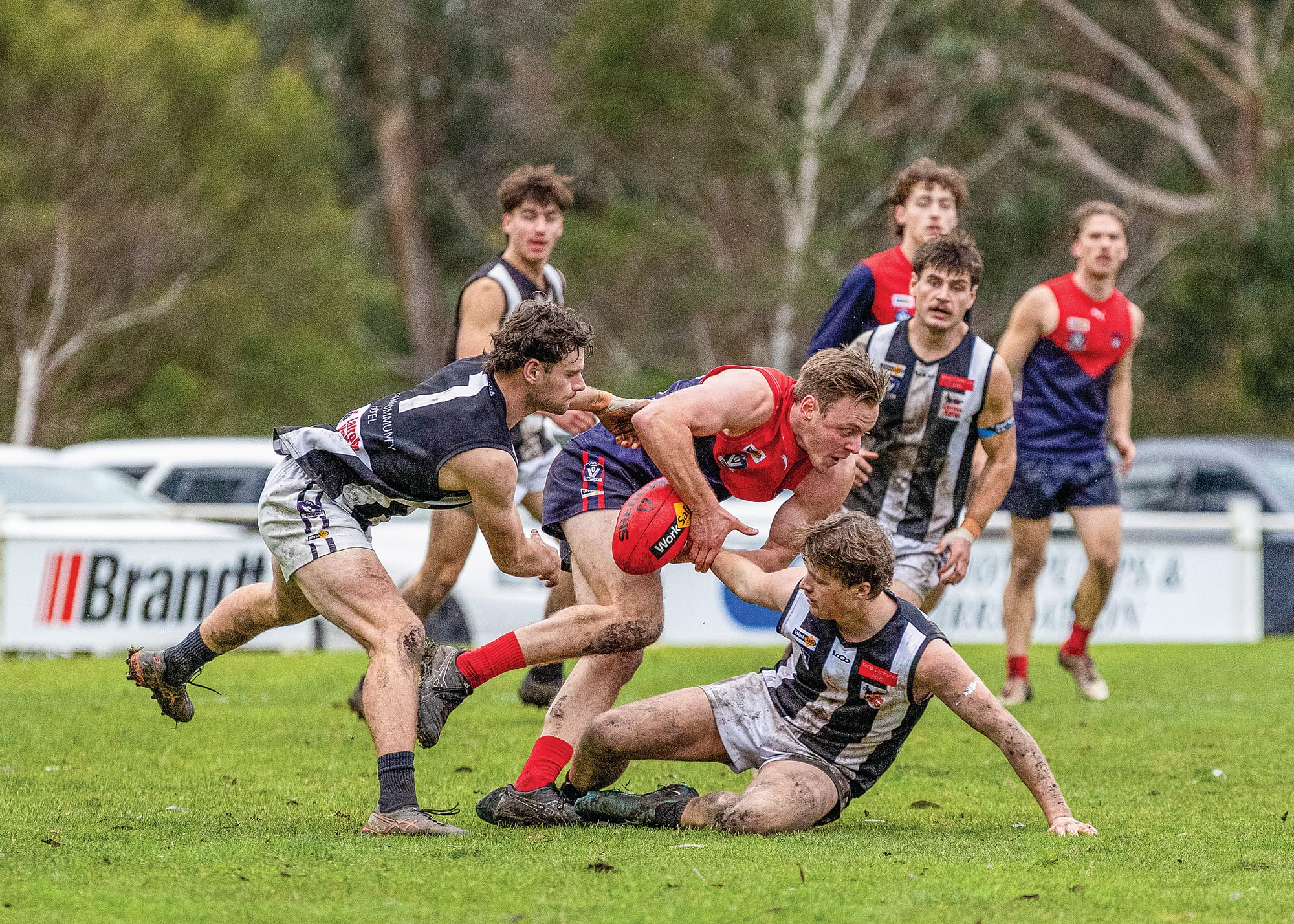 Dean Thorson attempts to control the ball as pressure is applied from his Yinnar opponents. 