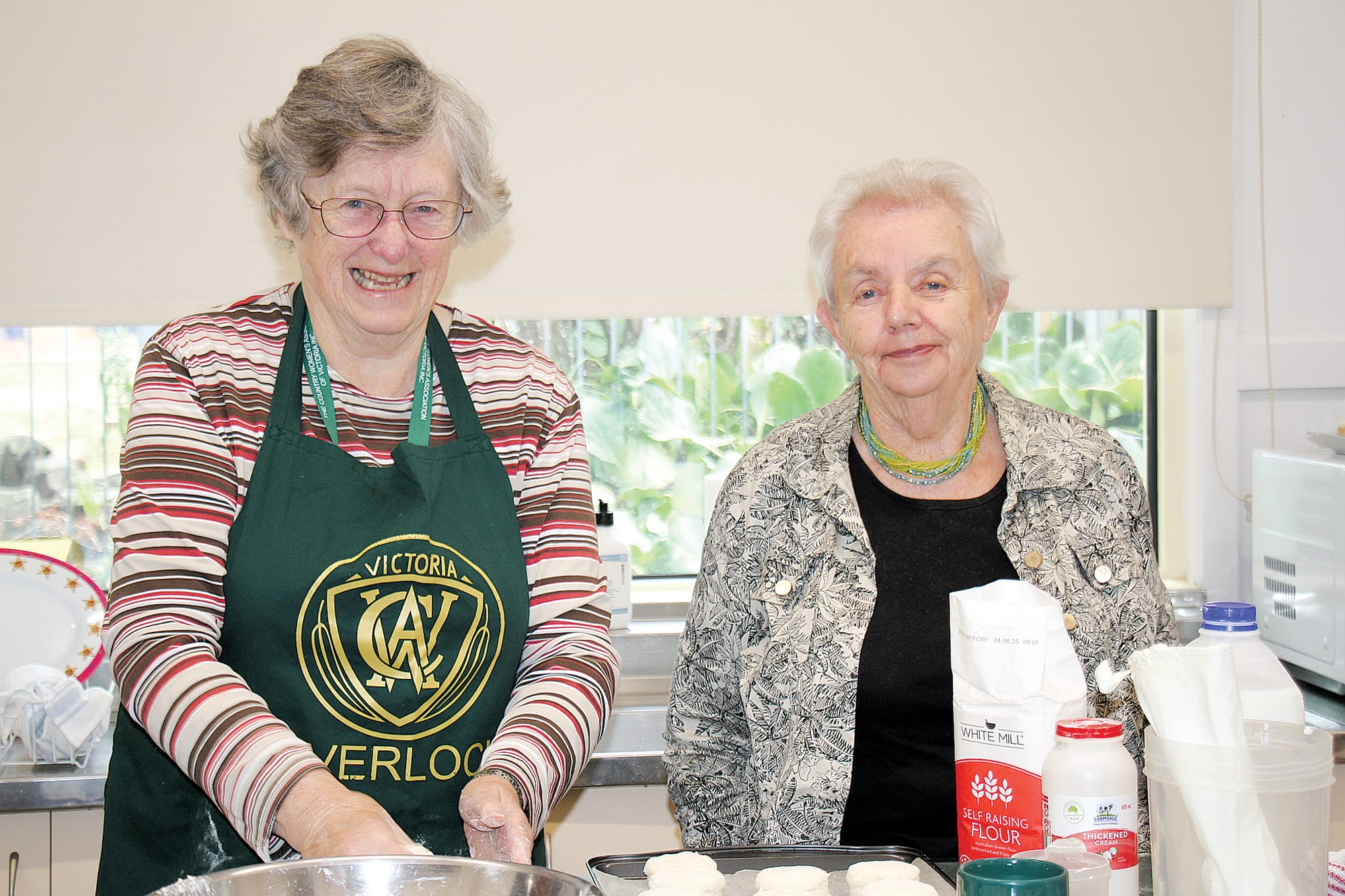 Wendy McBurnie Inverloch CWA and Ann Harrison Giffard CWA baking scones for the Gippsland Hills Group CWA 70th Exhibition. B38_1425