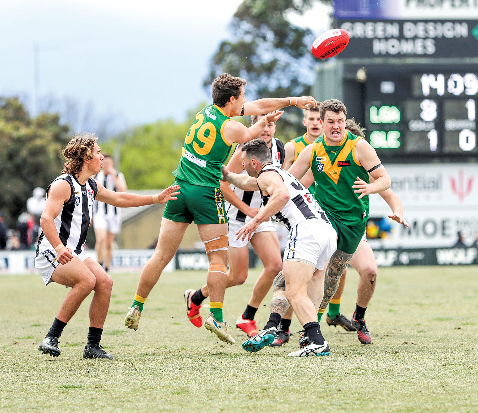 Ben Perry clears the footy under pressure during Leongatha’s reserves premiership win over Sale.