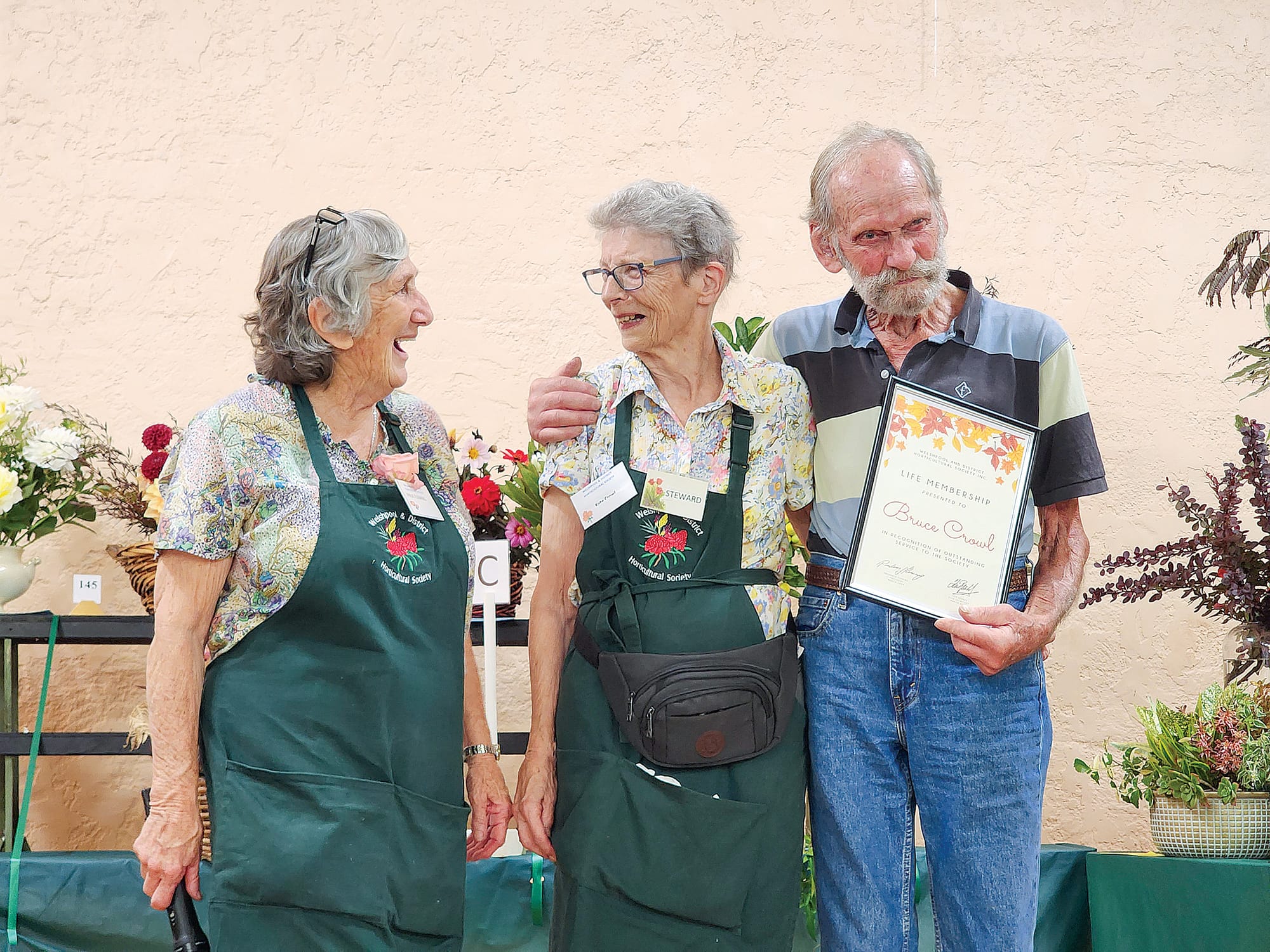 Assistant Show Secretary and Club President Prue Fleming with new life members Kate and Bruce Crowl. C23_1124