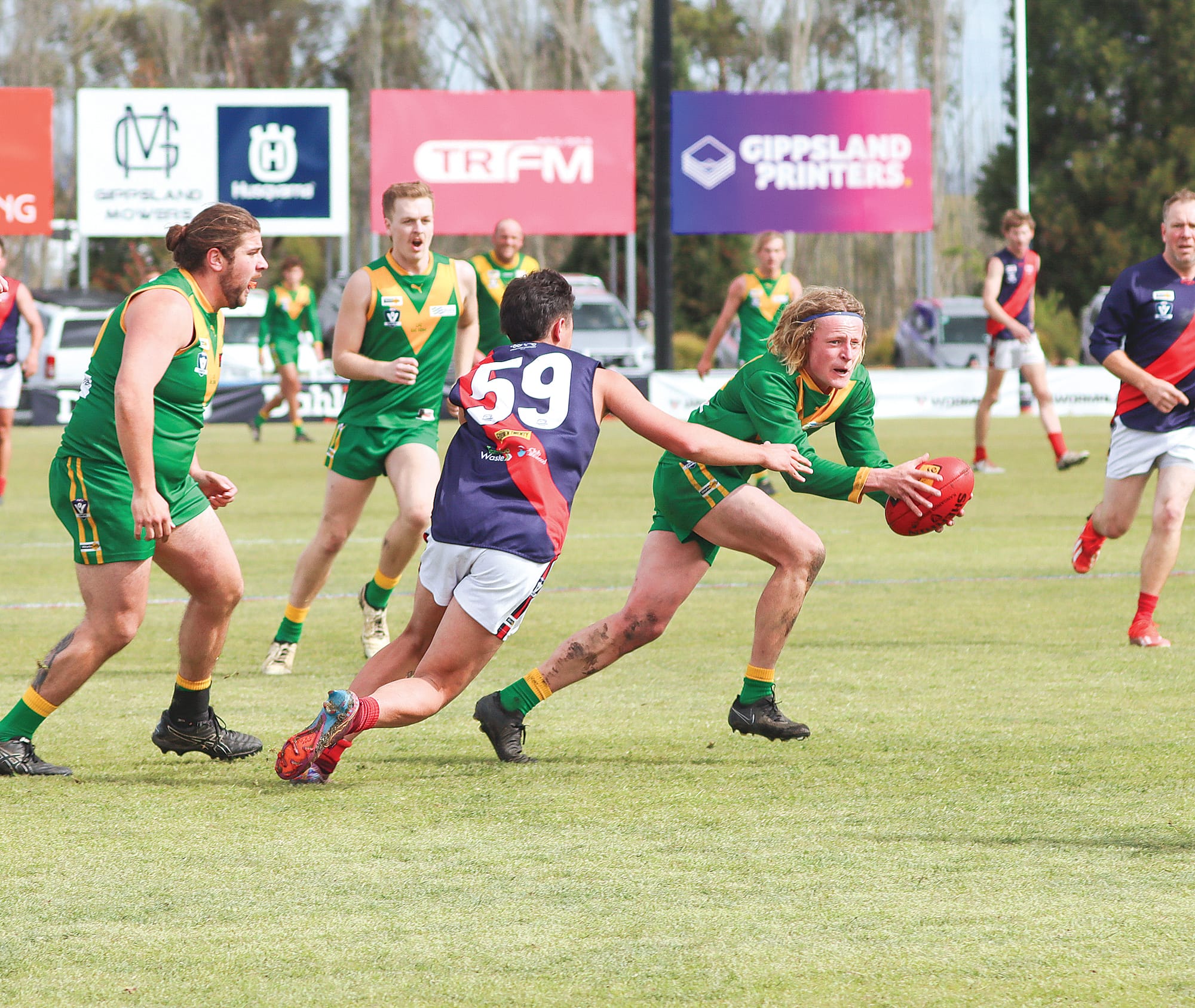 Ty Hall looks to burst clear for Leongatha late in its Reserves victory over Bairnsdale. A53_3924