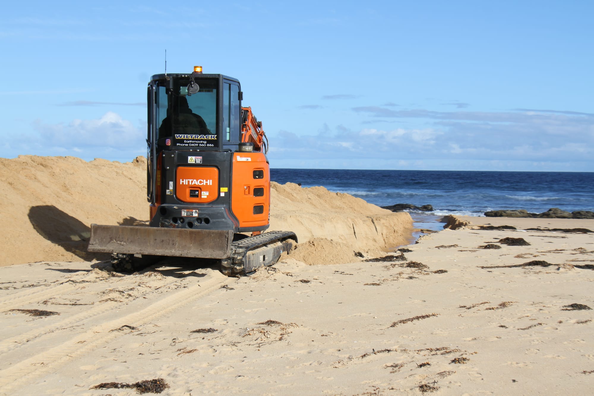 Mouth of the Powlett River dredged to clear flooding upstream