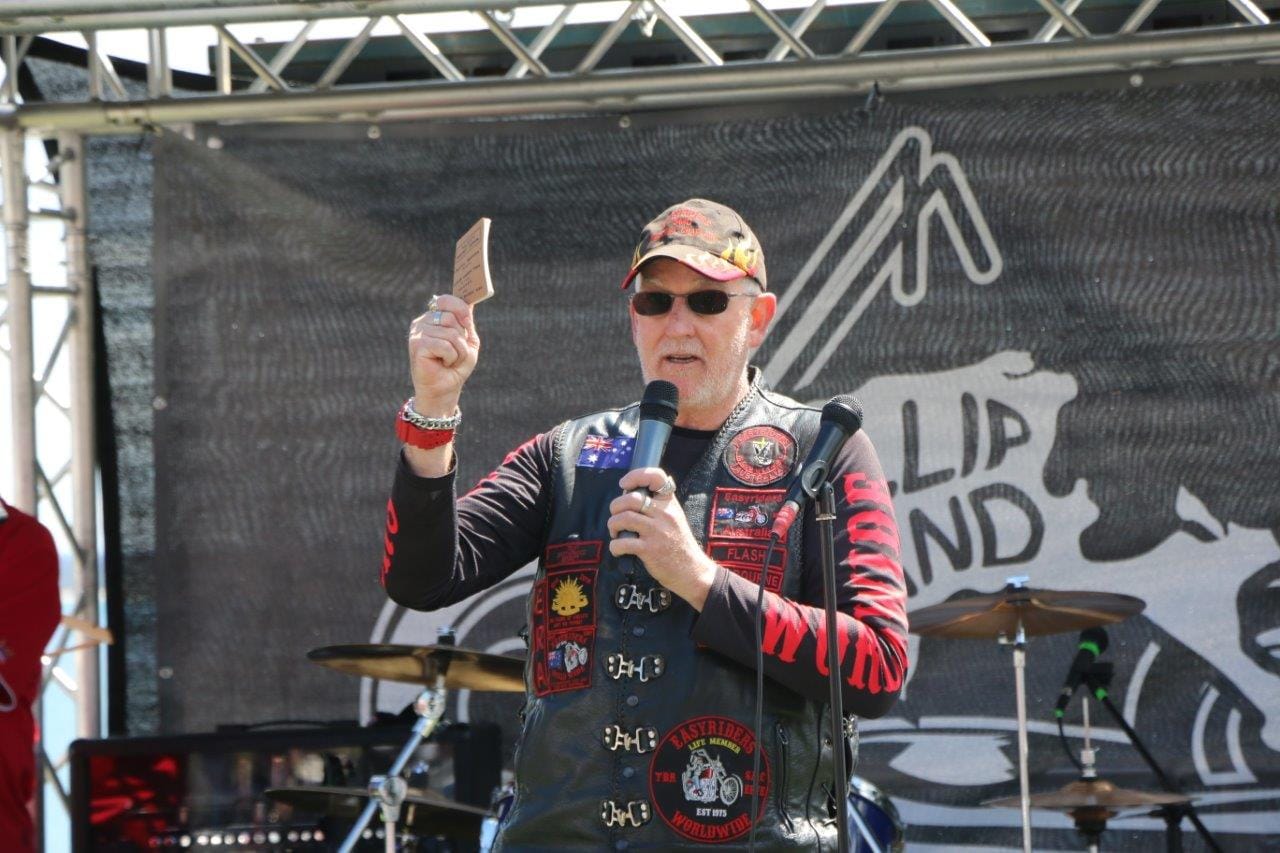 Chaplain Steve Ward provides a message from the good book but noted he was equally happy to see people devoted to the fun of motorcycle riding.