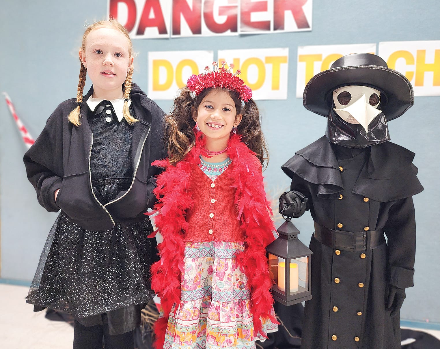 Savannah, Isla and Noah made a fantastic trio in their mixed costume array, including Wednesday Addams, Fancy Nancy and The Plague Doctor. C06_3425
