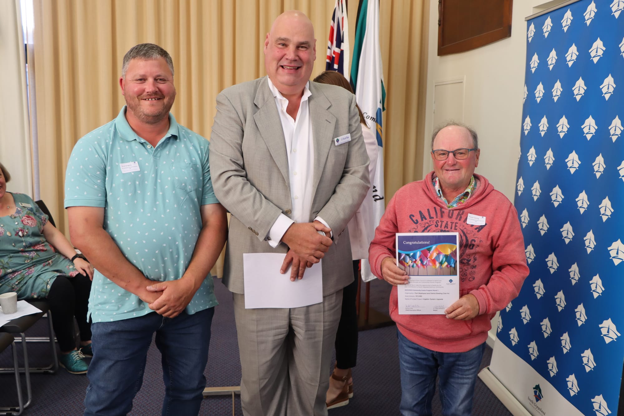 Errol Gregory and Trevor Vening of Port Welshpool & District Bowling Club with Cr Scott Rae.