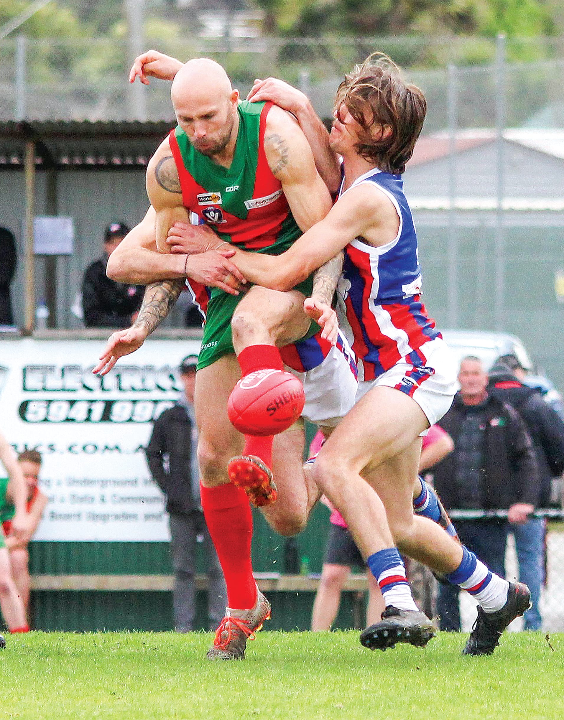 Phillip Island’s Billy Taylor tackles Seagull Brent Macaffer in the seniors Grand Final. B11_3722