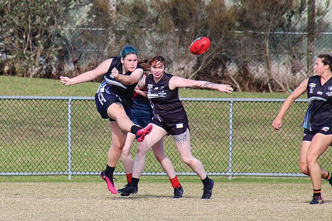 Jayde Lamb clears the ball out of the backline.