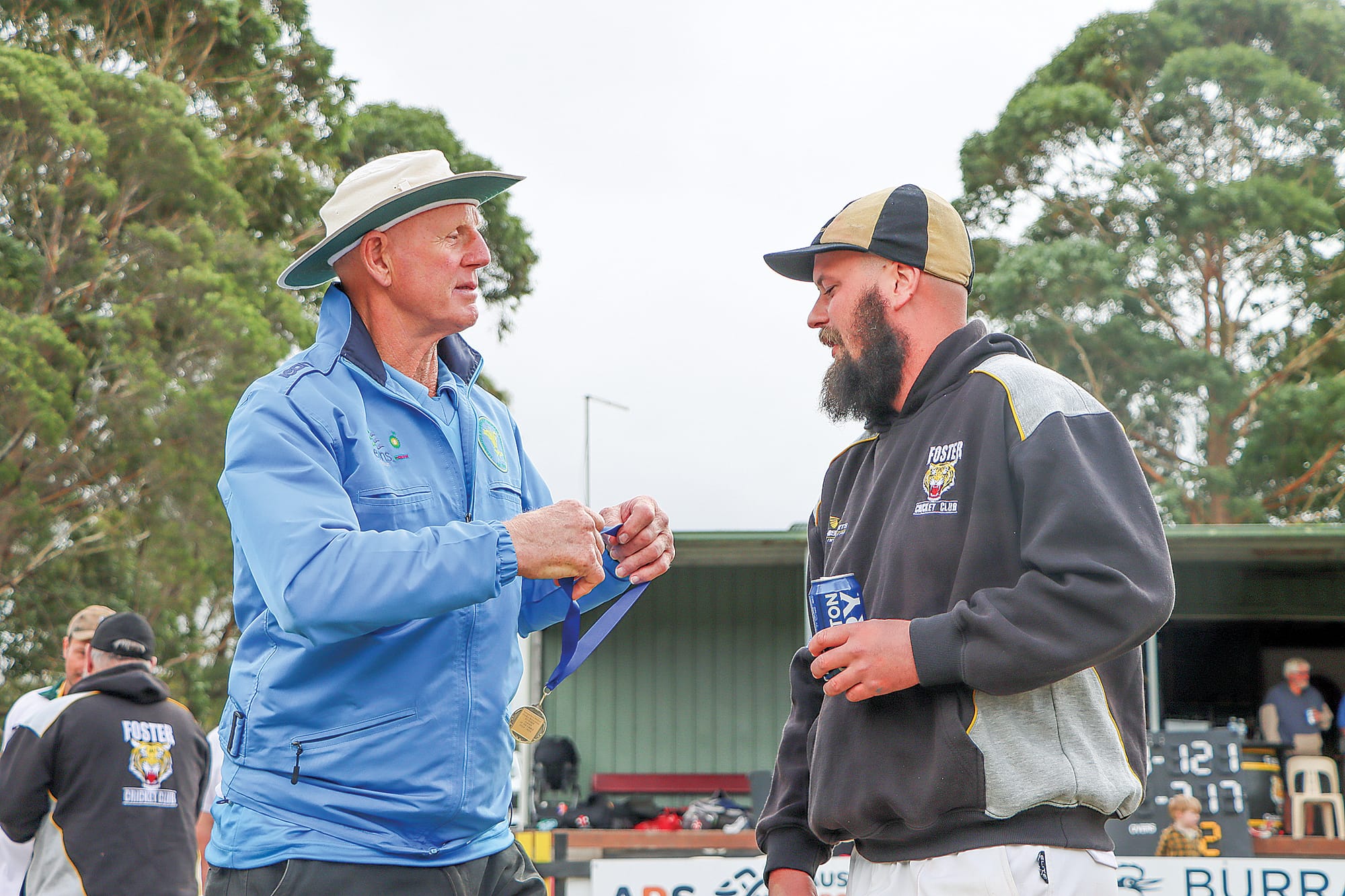 Jack Gay is pronounced man of the match, with umpire Ian Salmon ready to place the medal on his neck. A51_1325